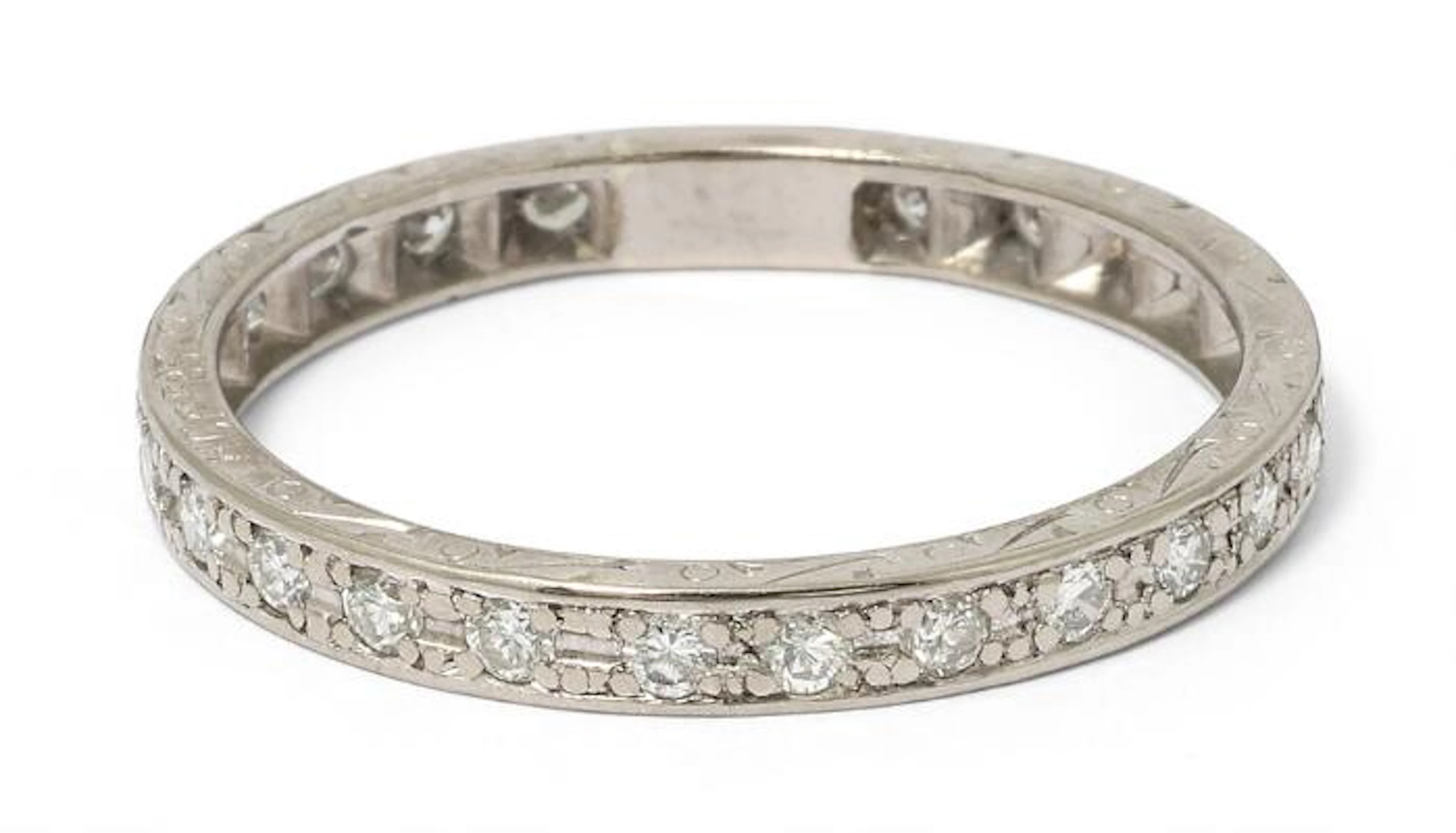 An eternity diamond ring set with numerous brilliant-cut diamonds