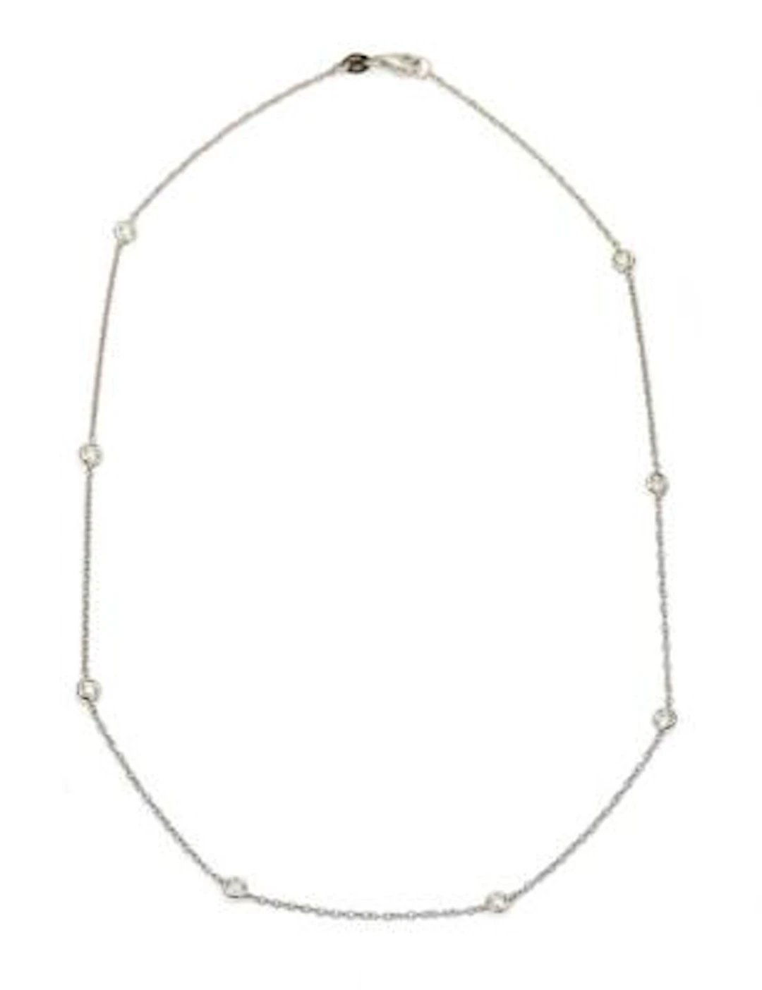 A diamond necklace set with numerous diamonds mounted in 18k white