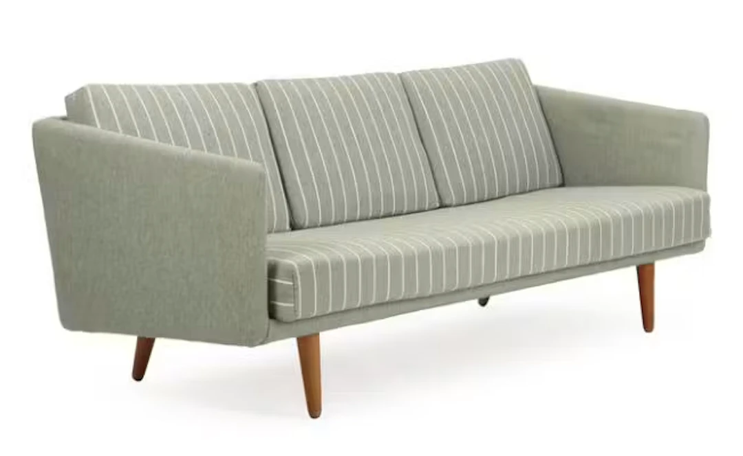 Børge Mogensen: A freestanding three seater sofa with oak legs, upholstered