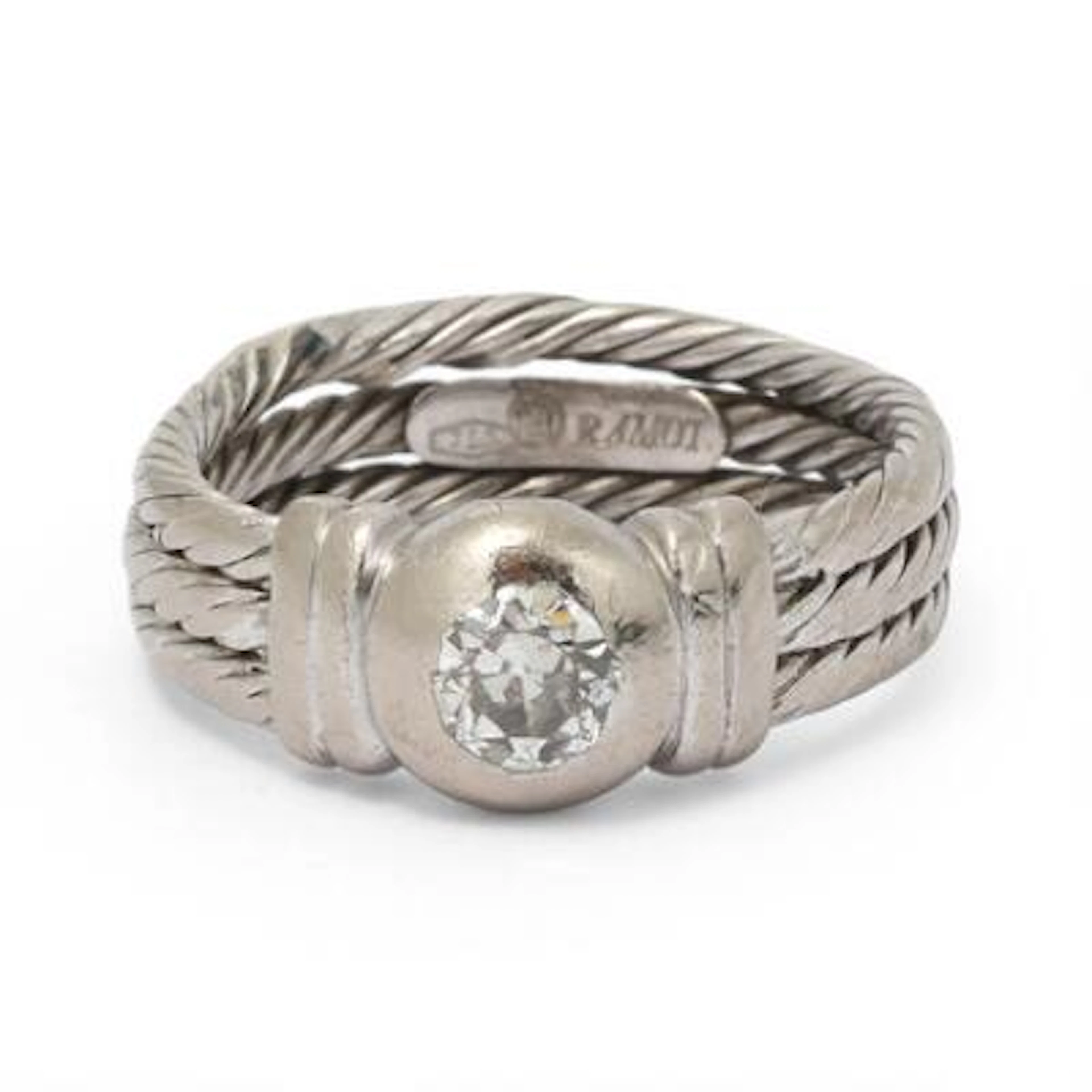 A diamond ring set with a brilliant-cut diamond weighing app. 0.35