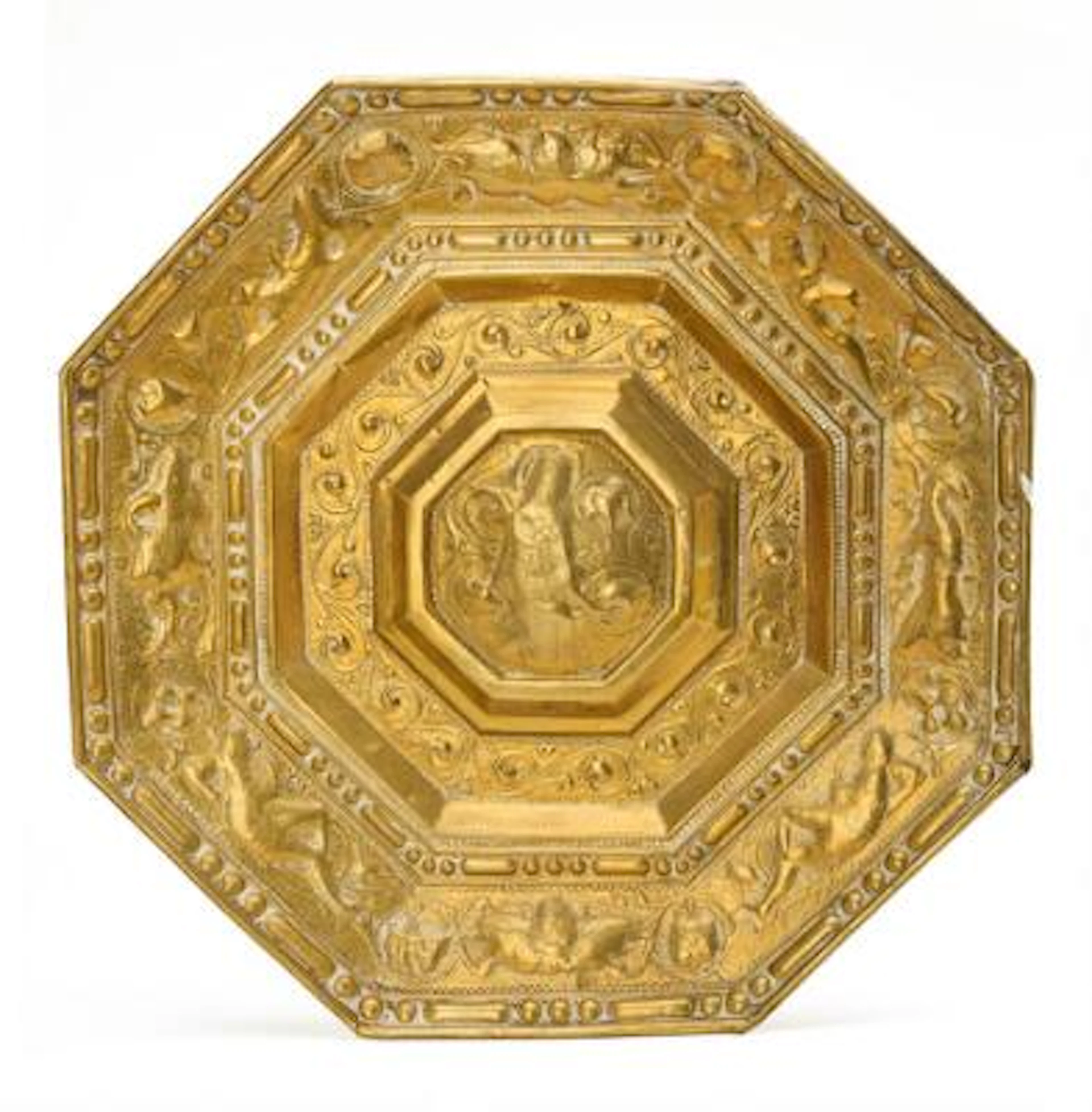 A probably Swedish mid-17th century Baroque brass light shield. 64
