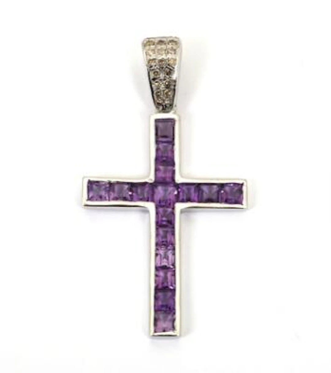 An amethyst pendant in the shape of a cross set with numerous fancy-cut