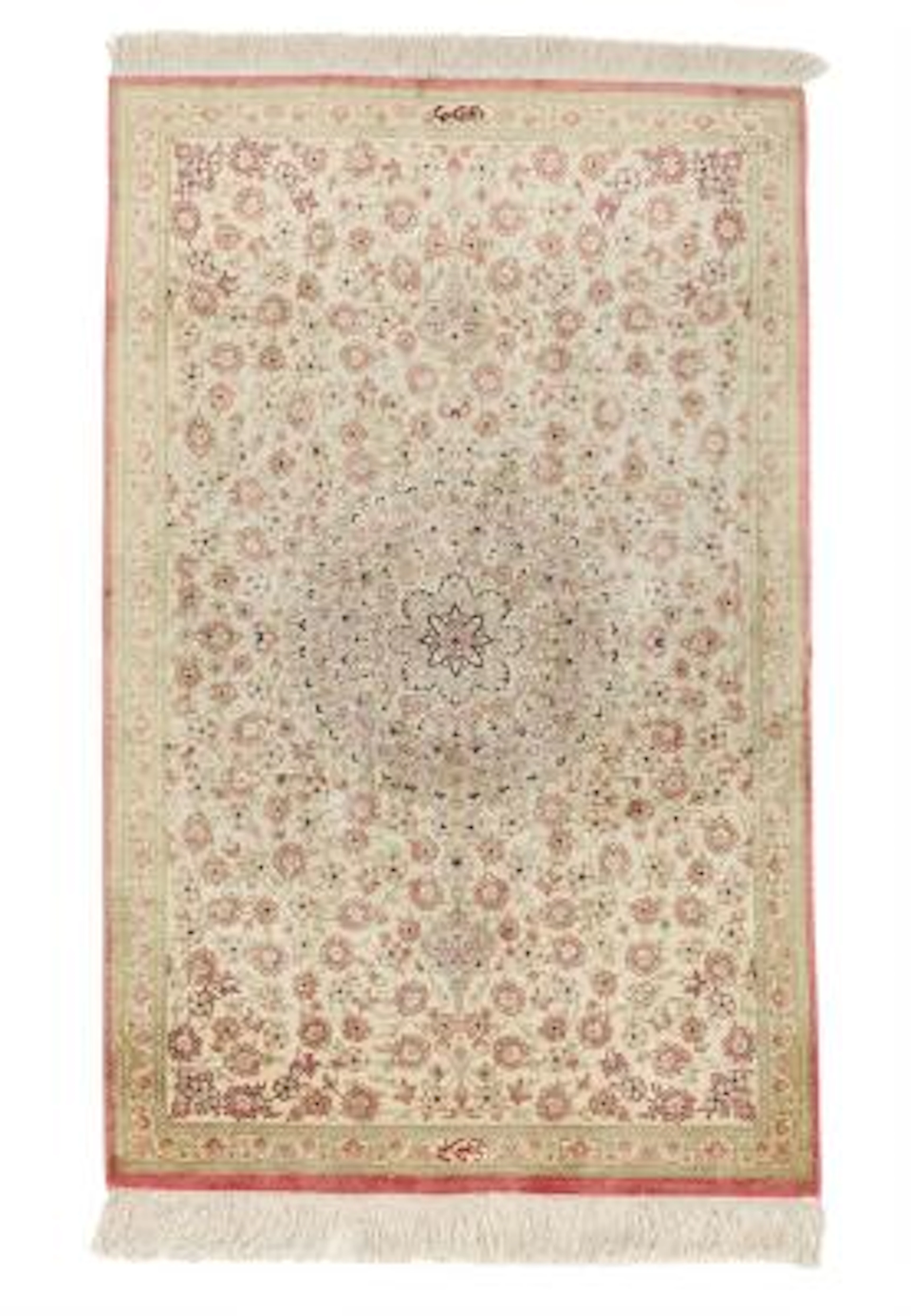 A signed Qum full silk rug, Persia. Classical medallion design with