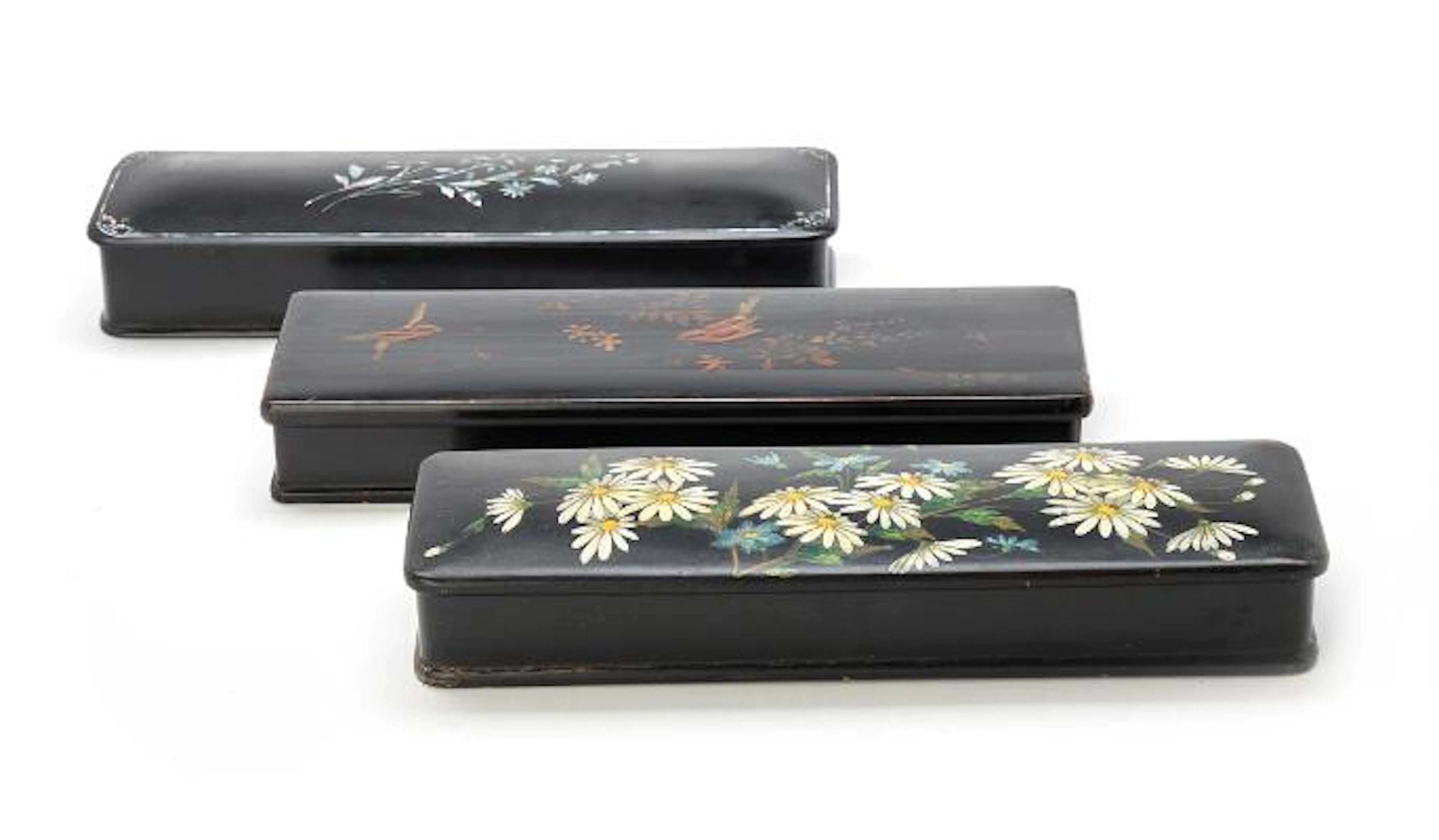 Three Japanese lacquer glove-boxes. Meiji/Taisho. L. approx. 30 cm.