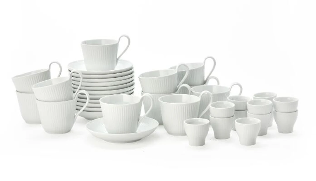 "White Fluted". 12 coffee cups aand saucers and 12 egg cups. Royal