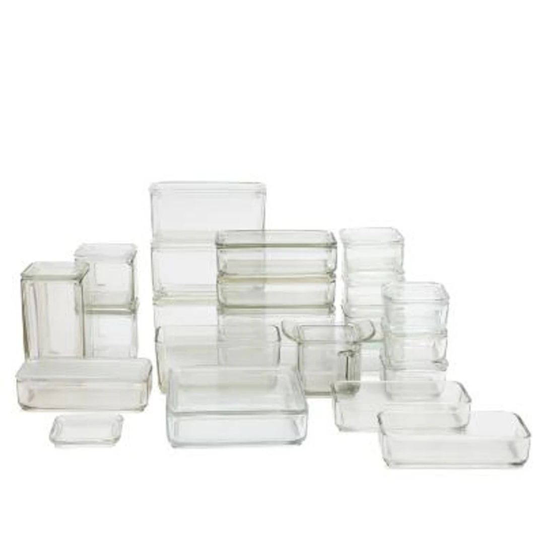 Wilhelm Wagenfeld: “Kubus”. A collection of 23 clear glass food containers