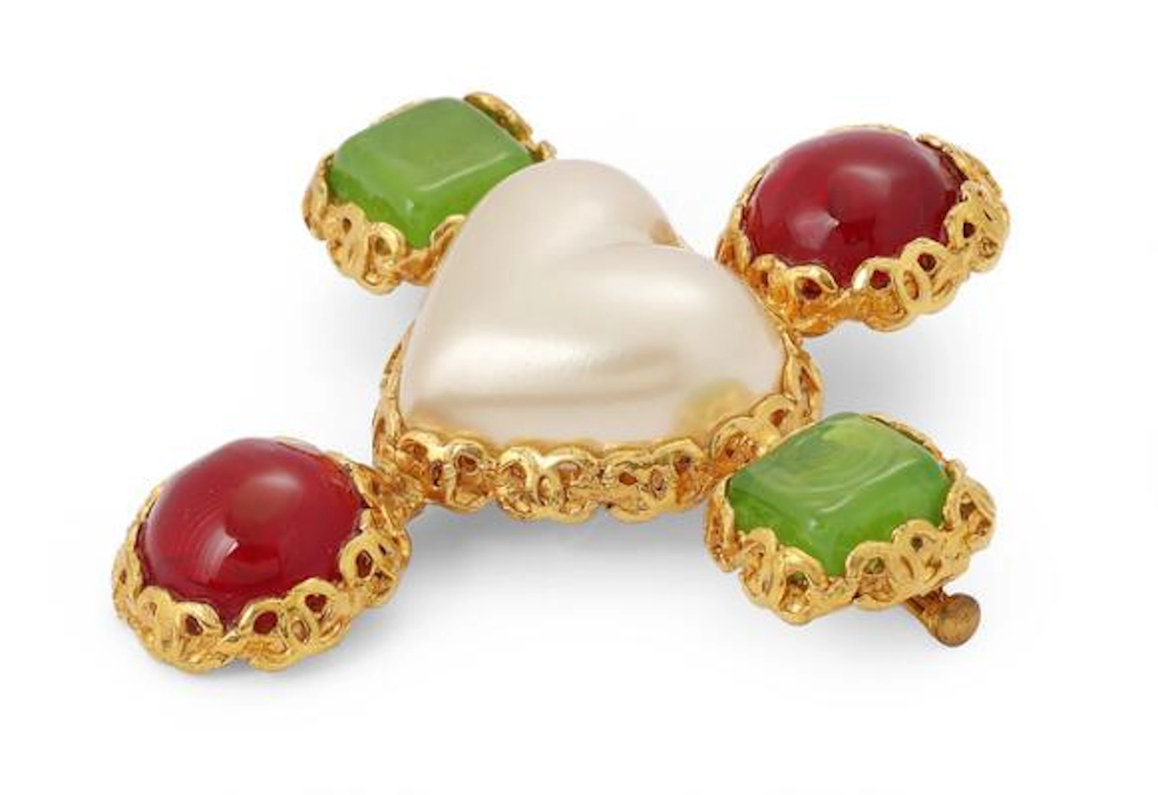 Chanel: A brooch set with an imitated pearl and four glass stones