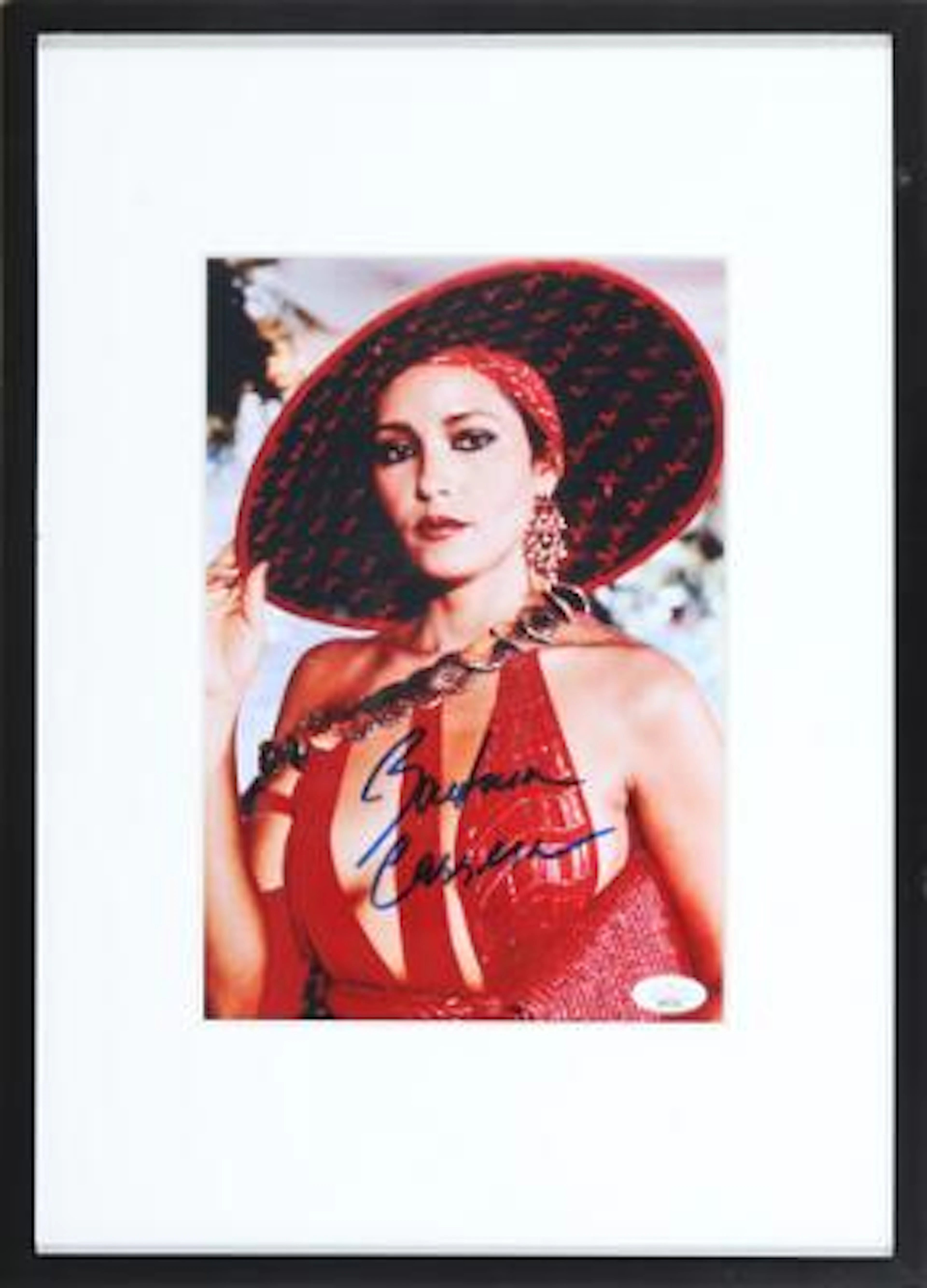 A signed colour still photograph of the Nicaraguan-American actress