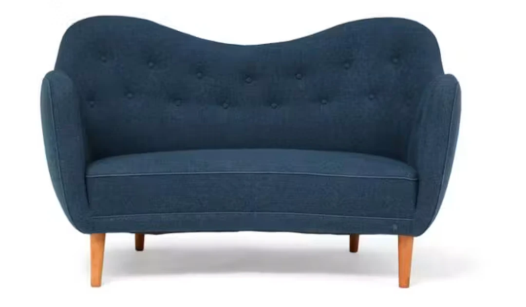 Finn Juhl: “BO 55”. Freestanding two seater sofa with round, tapering