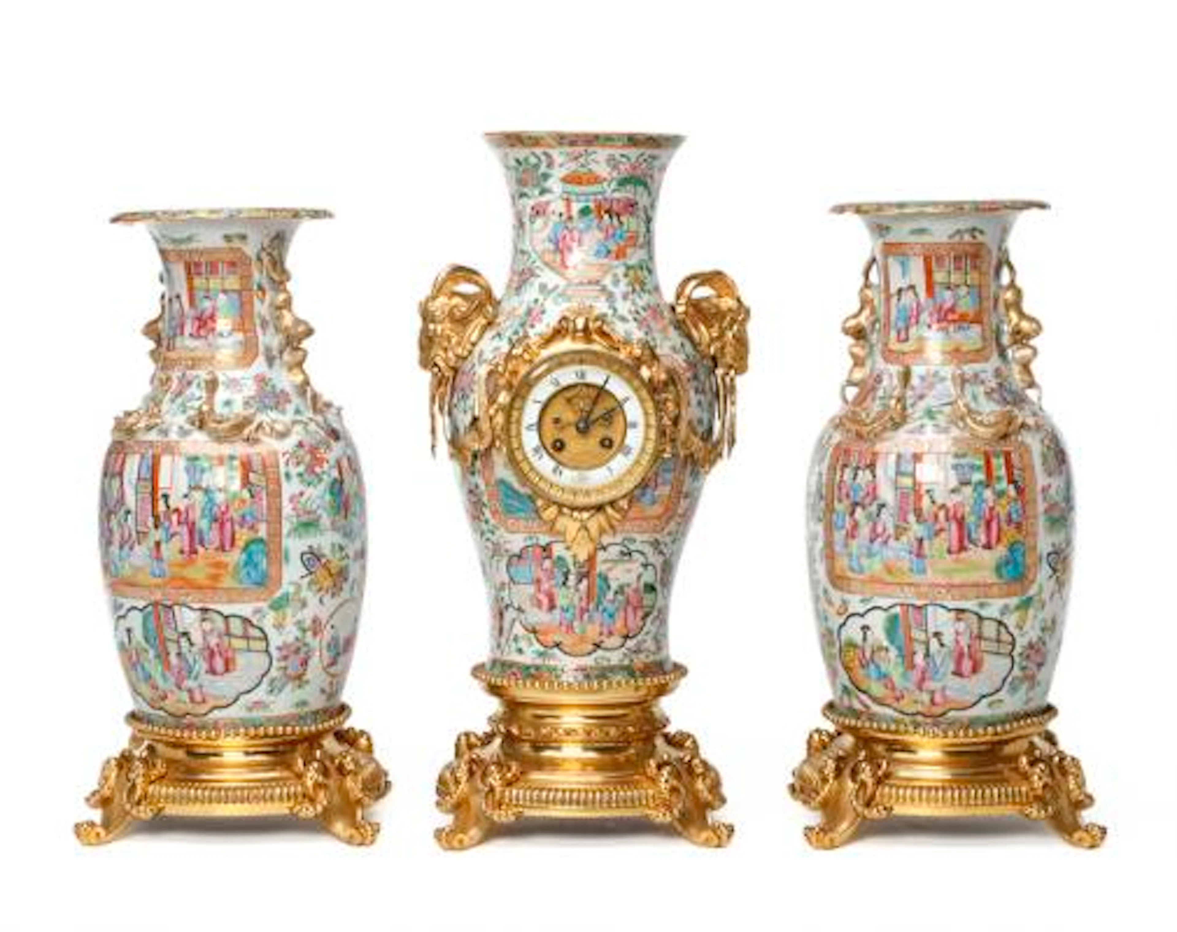 A large Napoleon III Cantonese porcelain and gilt bronze mantel set.