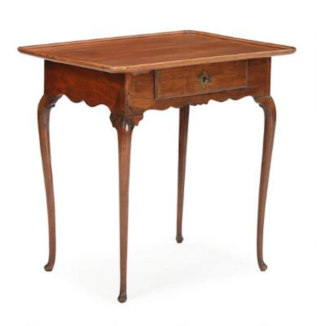 An 18th century Rococo walnut console table, front with drawer and