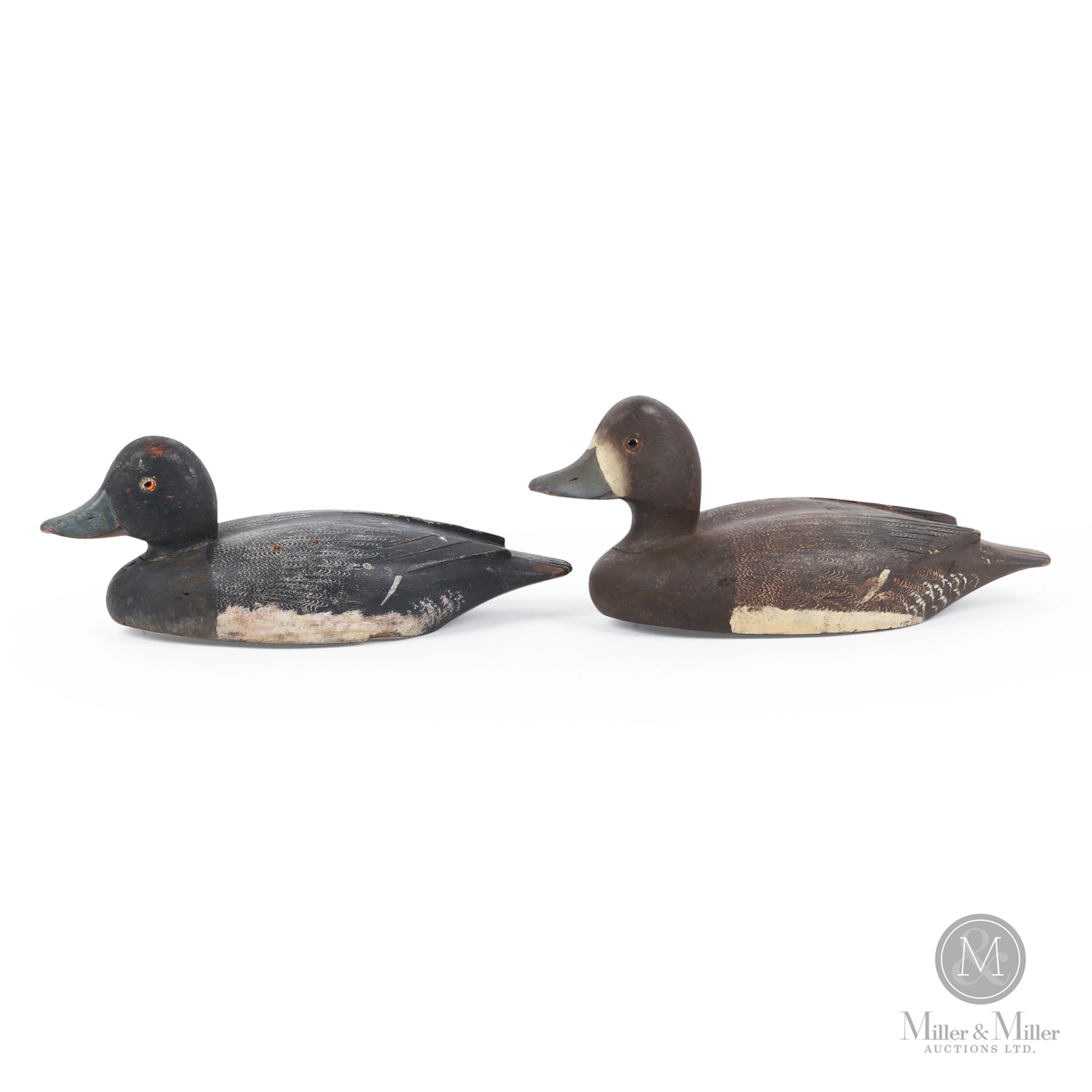 Pair of D. W. "Davey" Nichol Bluebill Decoys