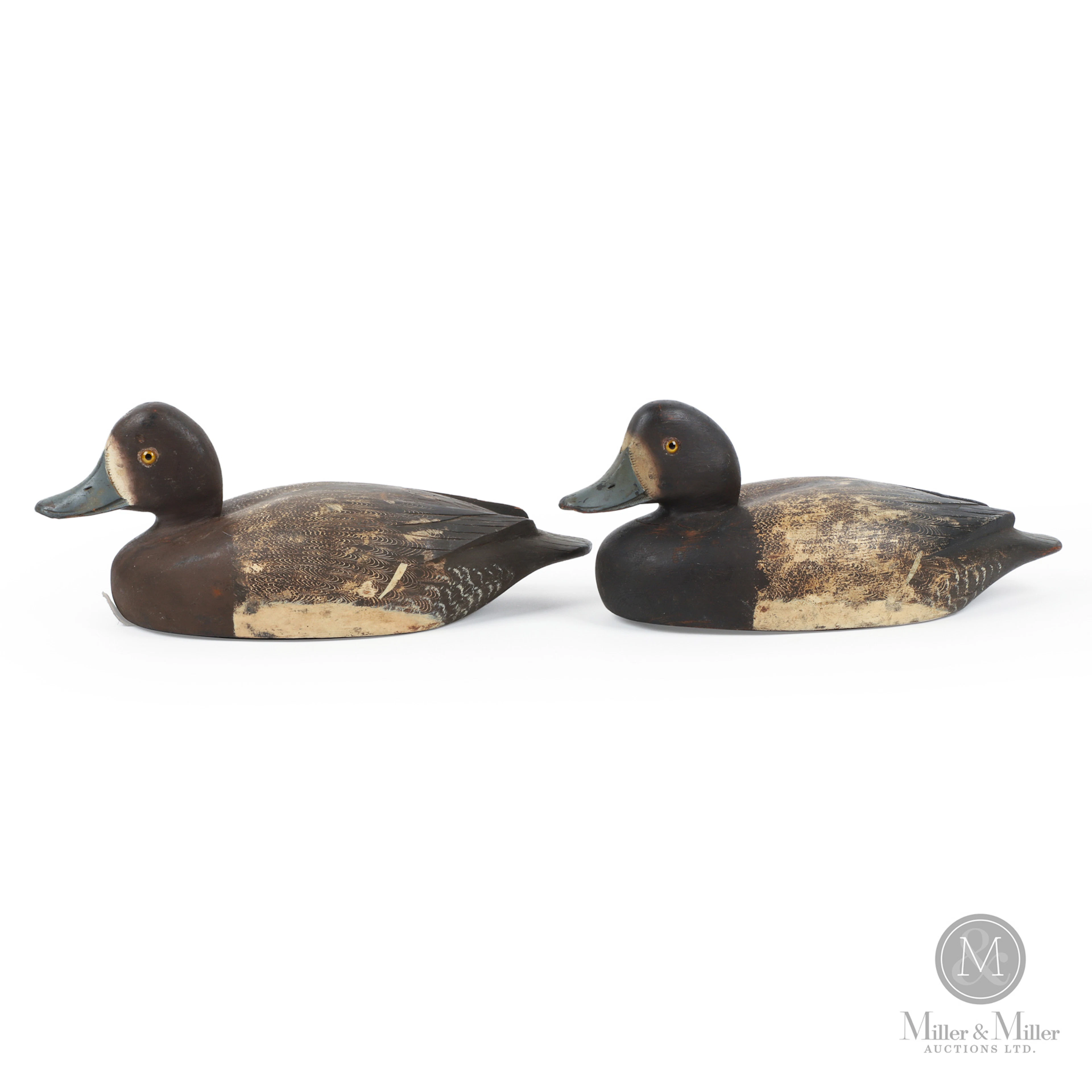 Pair of D. W. "Davey" Nichol Bluebill Hen Decoys