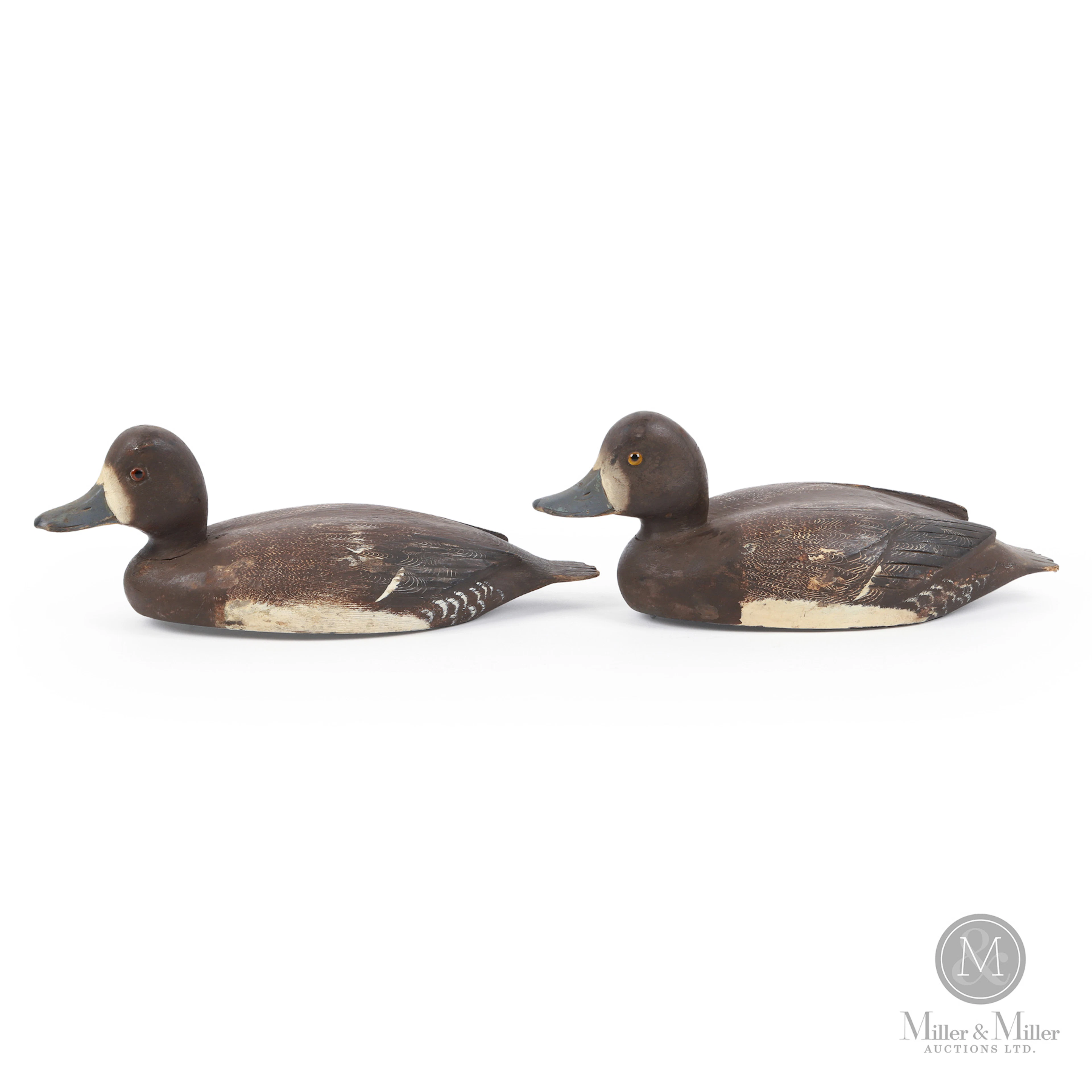 Pair of D. W. "Davey" Nichol Bluebill Hen Decoys