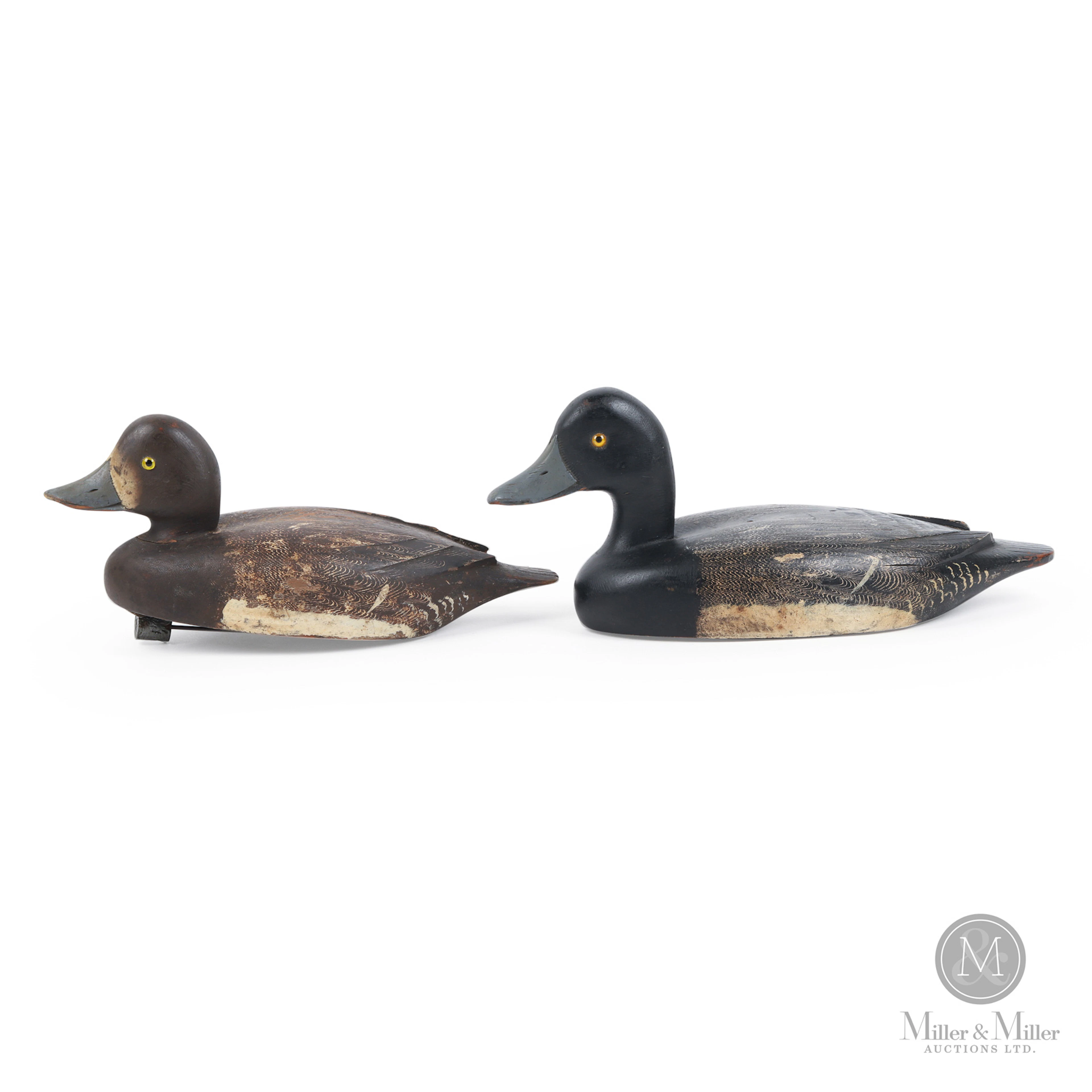 Pair of D. W. "Davey" Nichol Bluebill Decoys