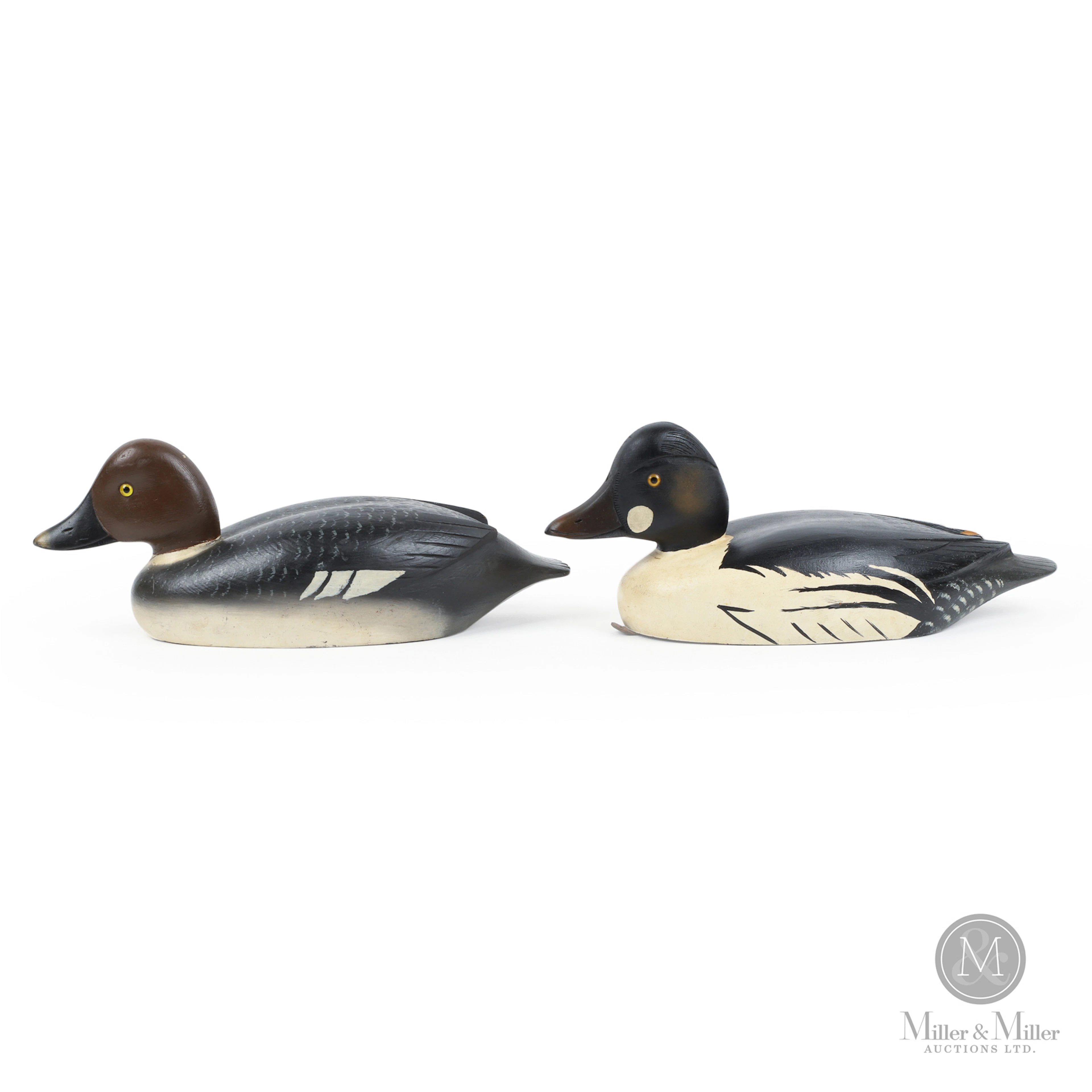 Pair of D. W. "Davey" Nichol Golden Eye Decoys