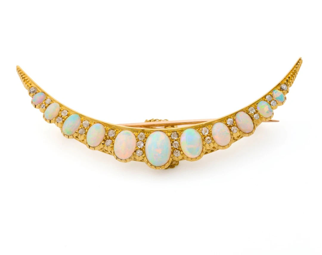 Opal crescent brooch