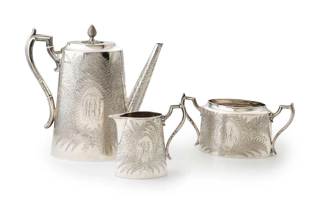 An Edward VII silver three-piece coffee service, James Dixon & Sons