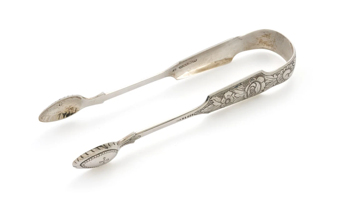 A pair of Irish silver sugar tongs, maker's mark SD, Dublin, 1865