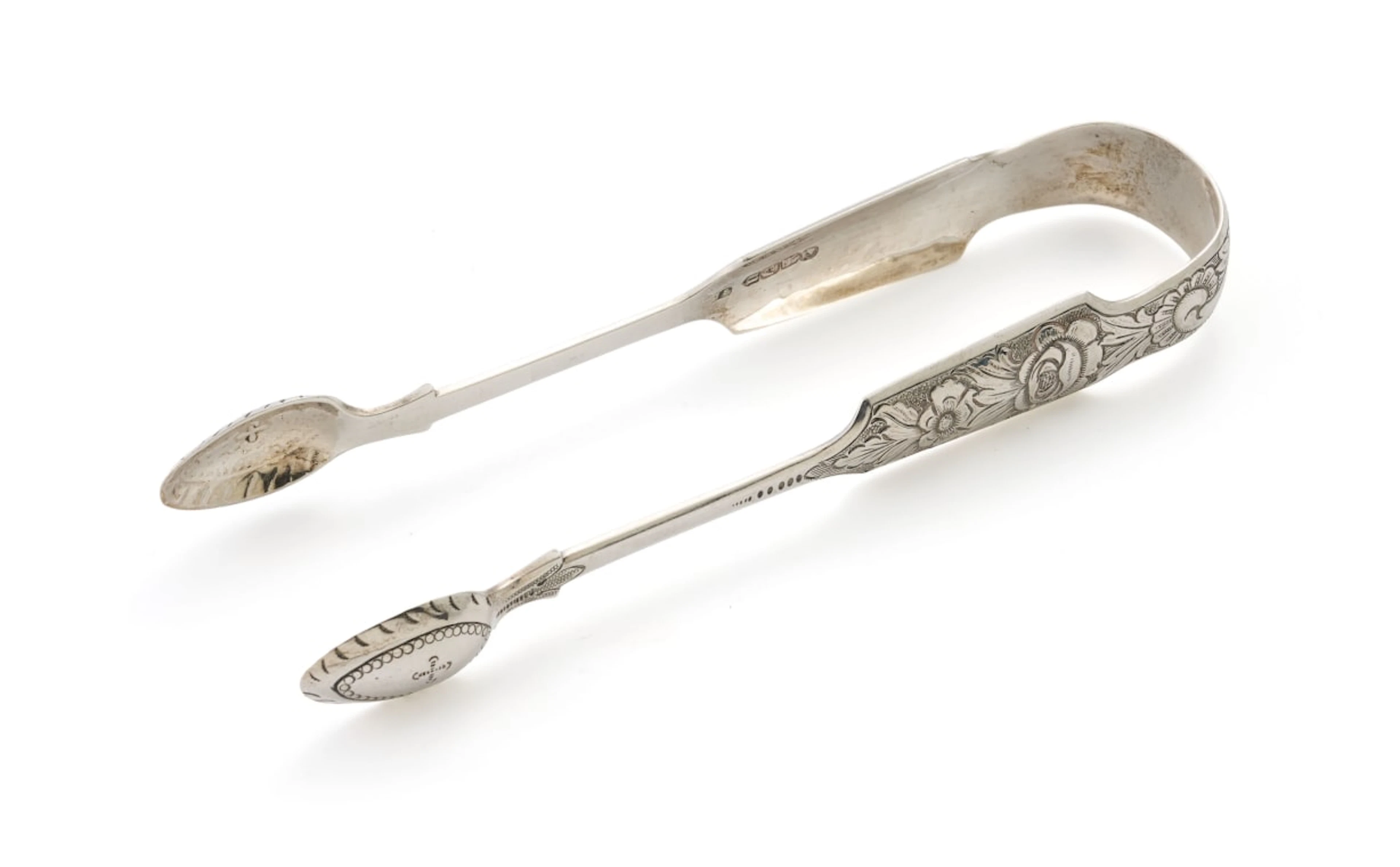 A pair of Irish silver sugar tongs, maker's mark SD, Dublin, 1865