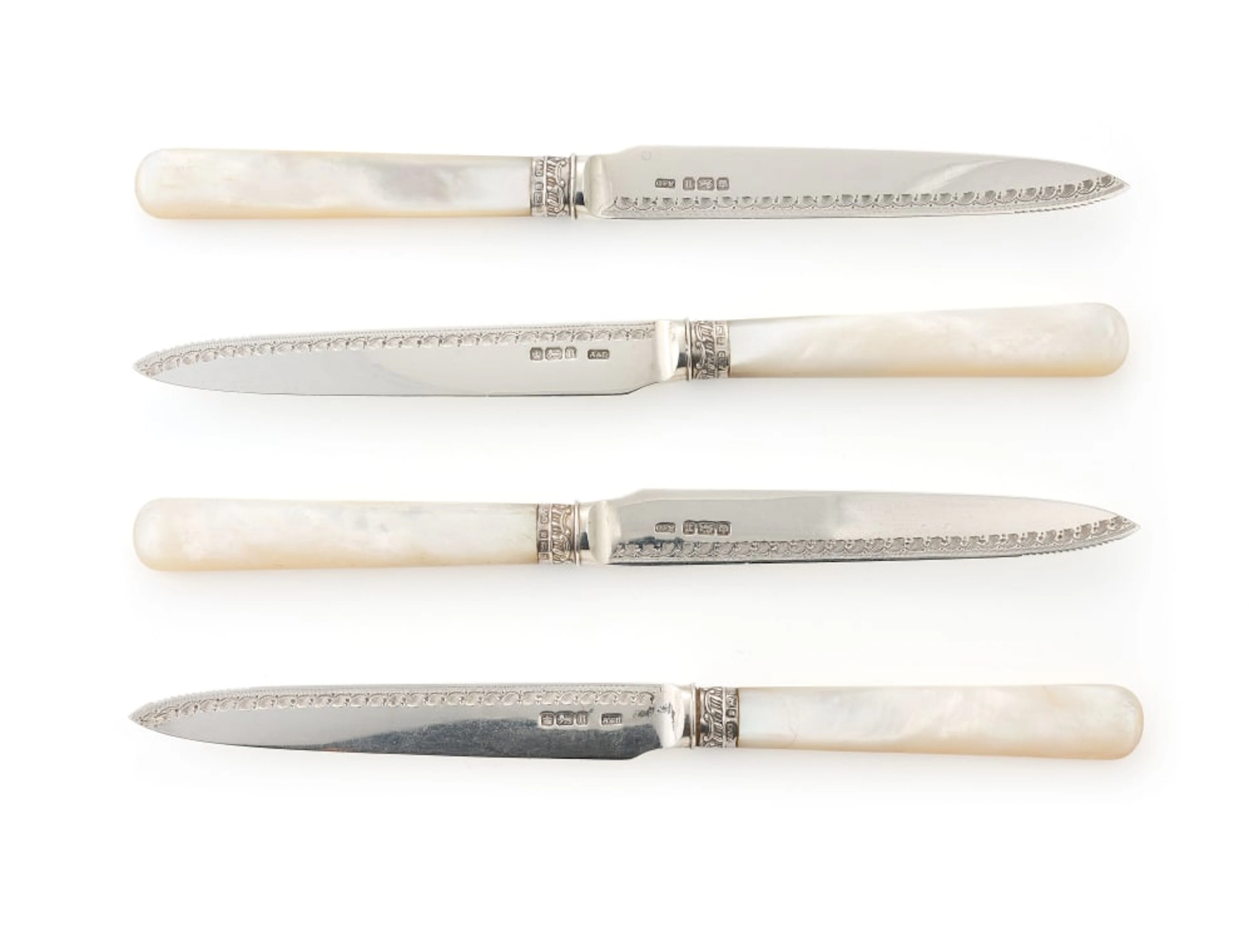 Four Edward VII silver and mother-of-pearl fruit knives, Allen & Darwin