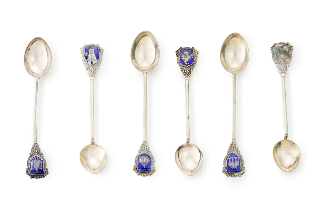 Six sterling silver and enamel souvenir teaspoons