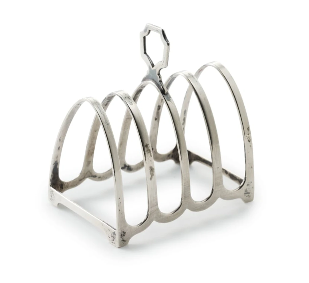An Elizabeth II silver toast rack, Mappin and Webb, Birmingham, 1964