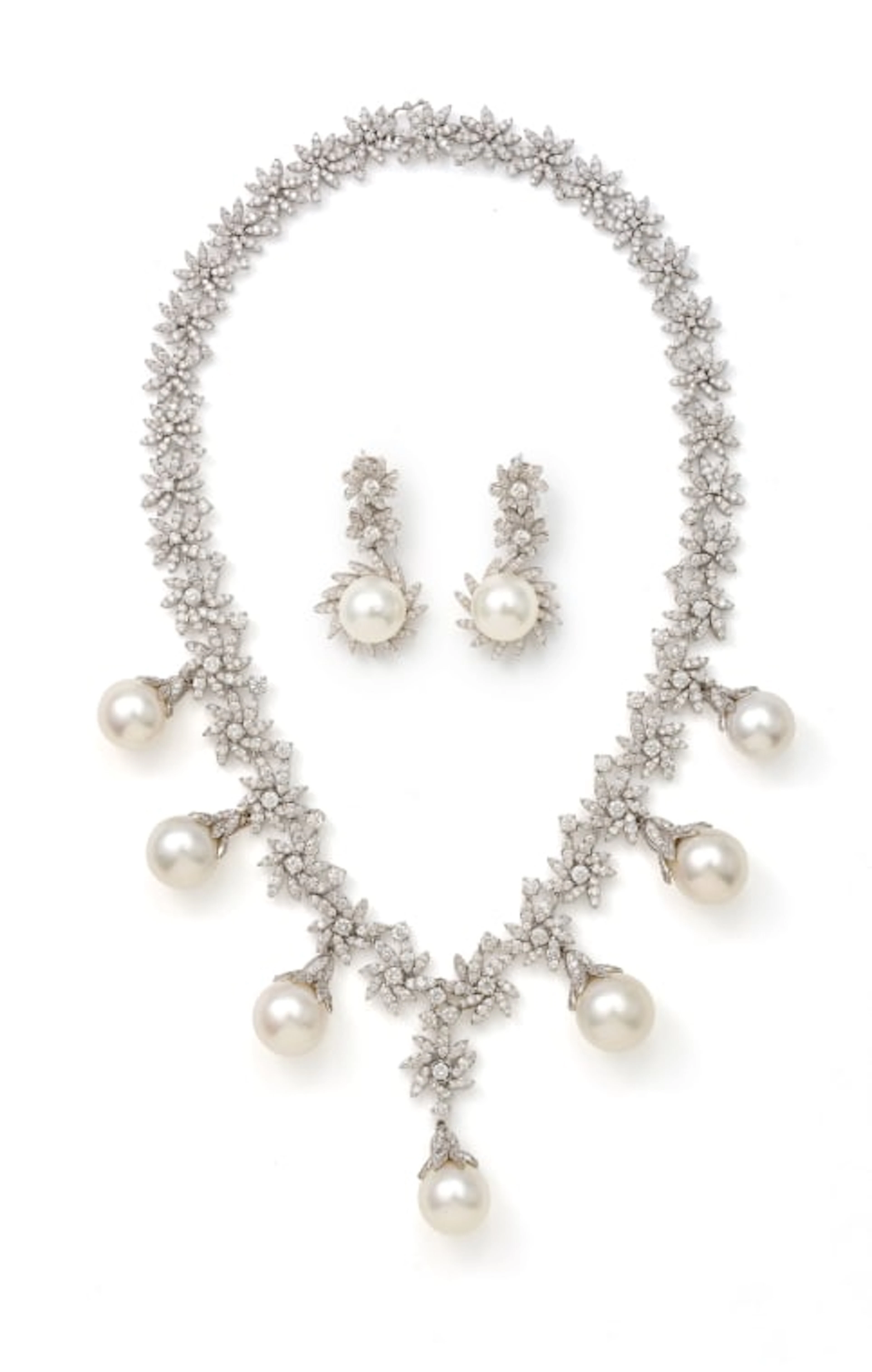 Al Moallim Jewellery; Diamond and South Sea pearl necklace and earring suite