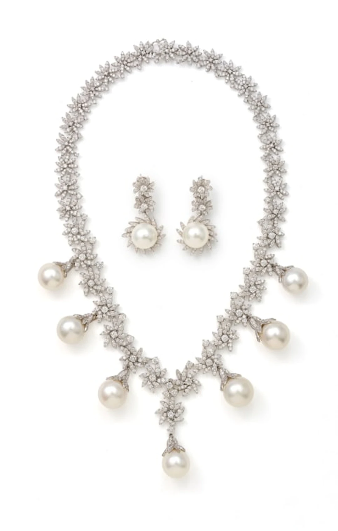 Al Moallim Jewellery; Diamond and South Sea pearl necklace and earring suite