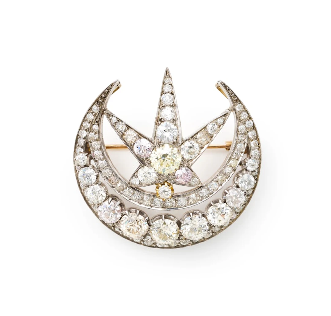 Crescent moon and star brooch