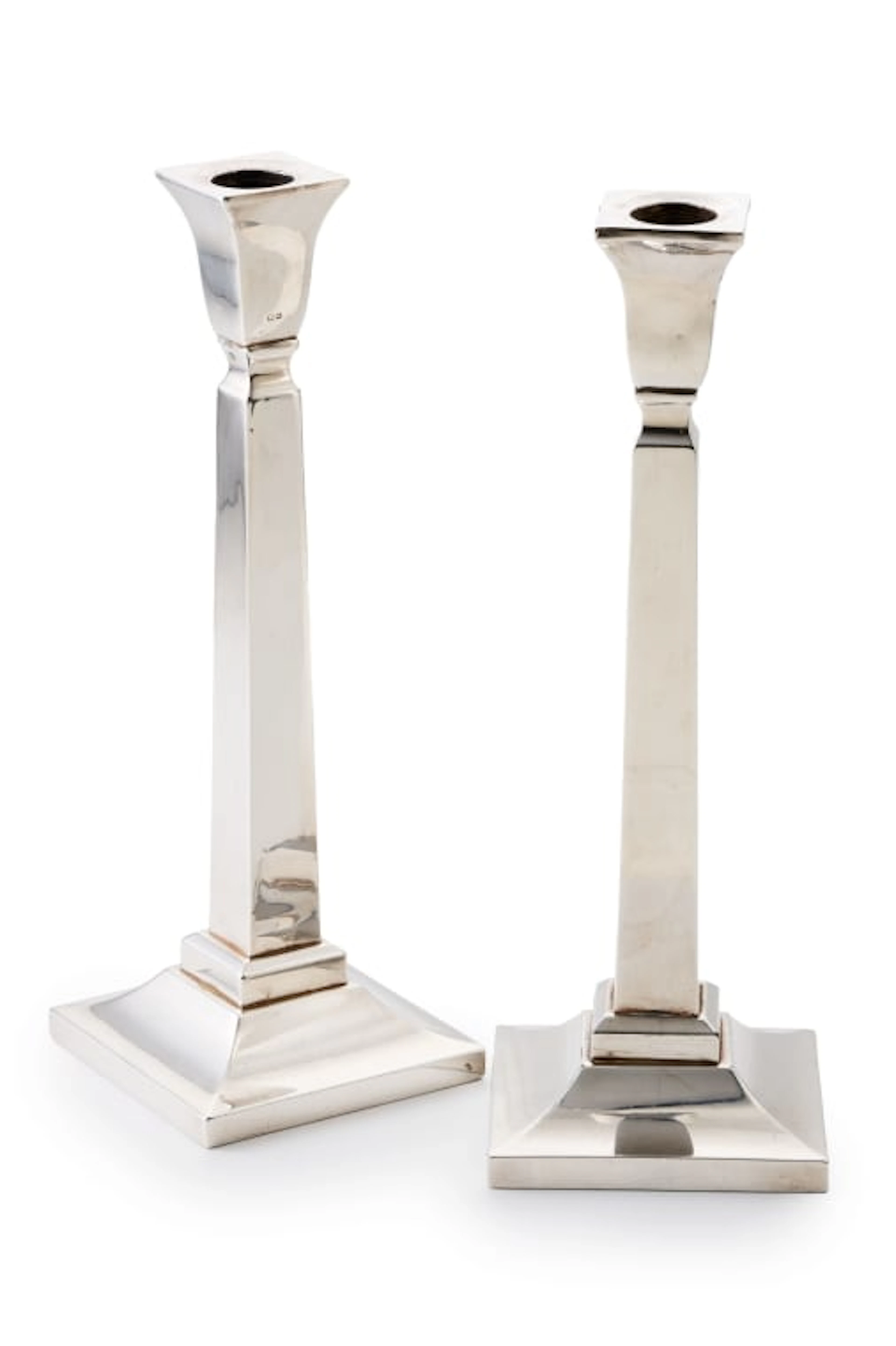 A pair of George V silver candlesticks, British Metallising Co Ltd