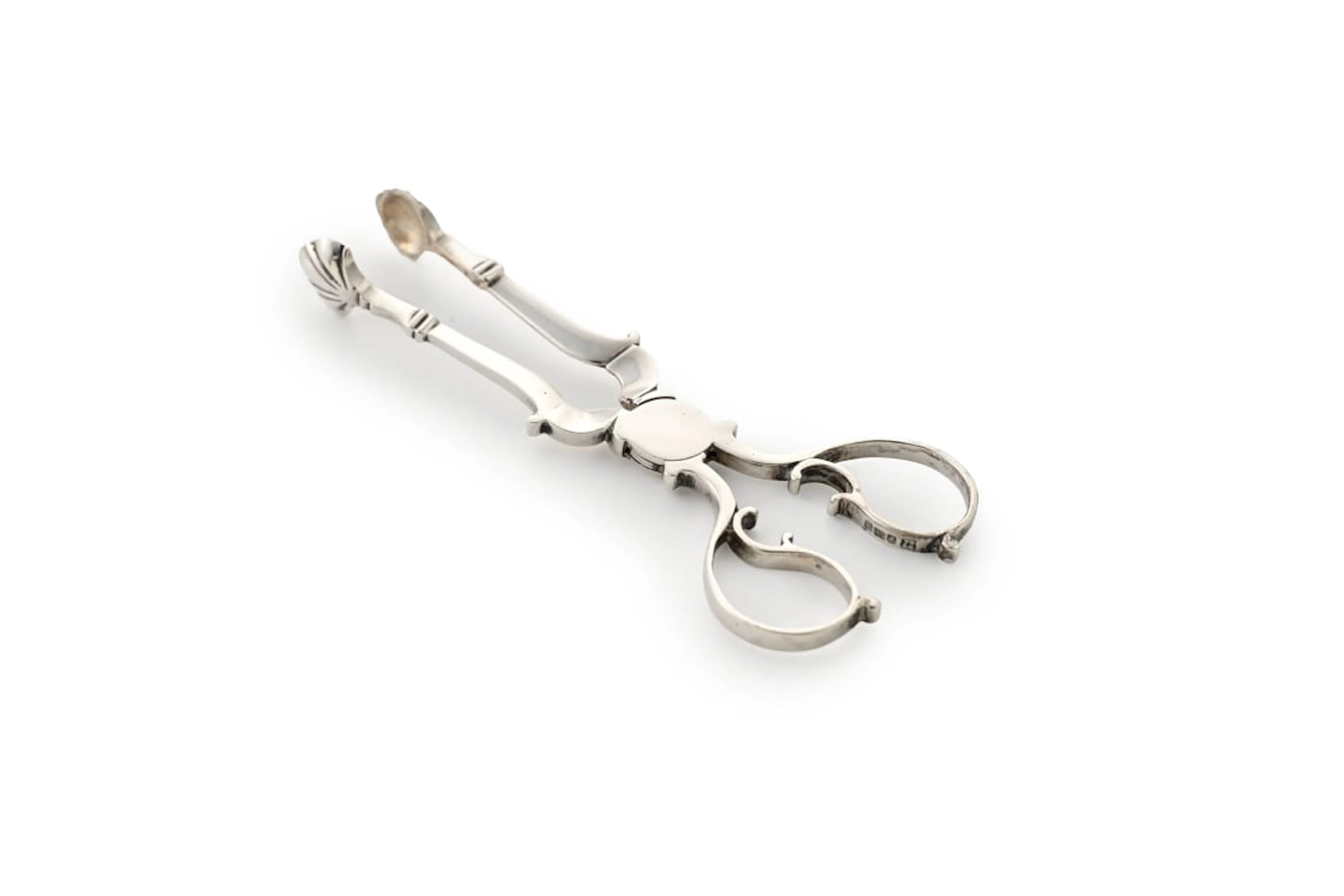 A pair of George V silver sugar nips, Thomas Bradbury & Sons, Sheffield, 1915