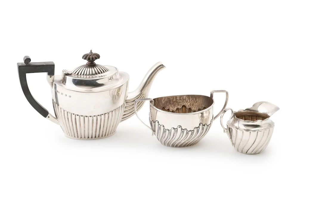 An assembled Victorian silver three-piece tea service, John Millward