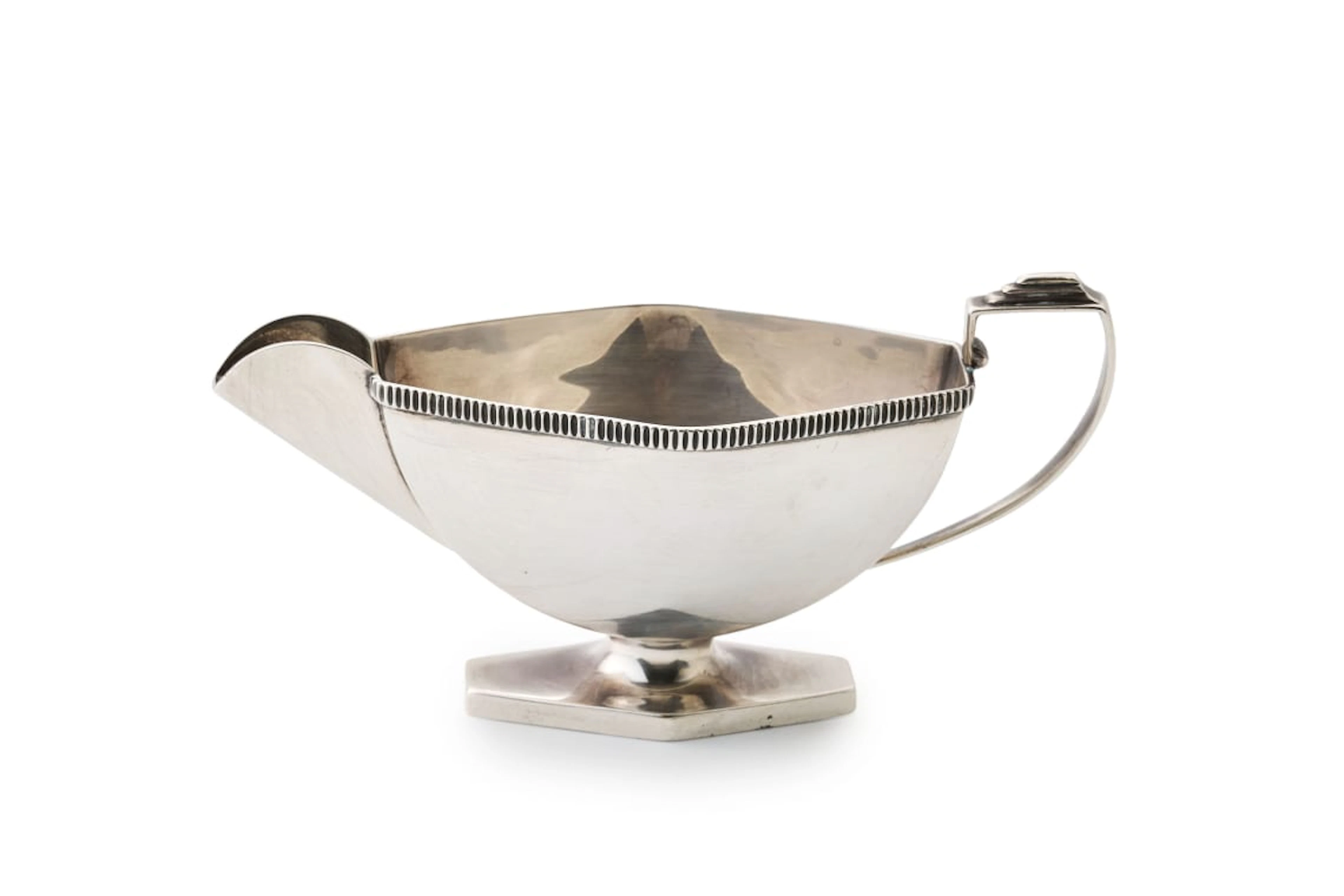A George V silver milk jug, Ernest W Haywood, Birmingham, 1935