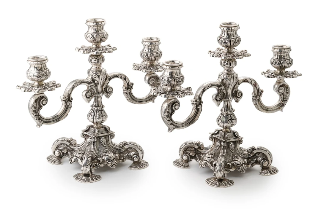 A pair of Portuguese silver three-light ornate leaf candelabra, c.1881-1887