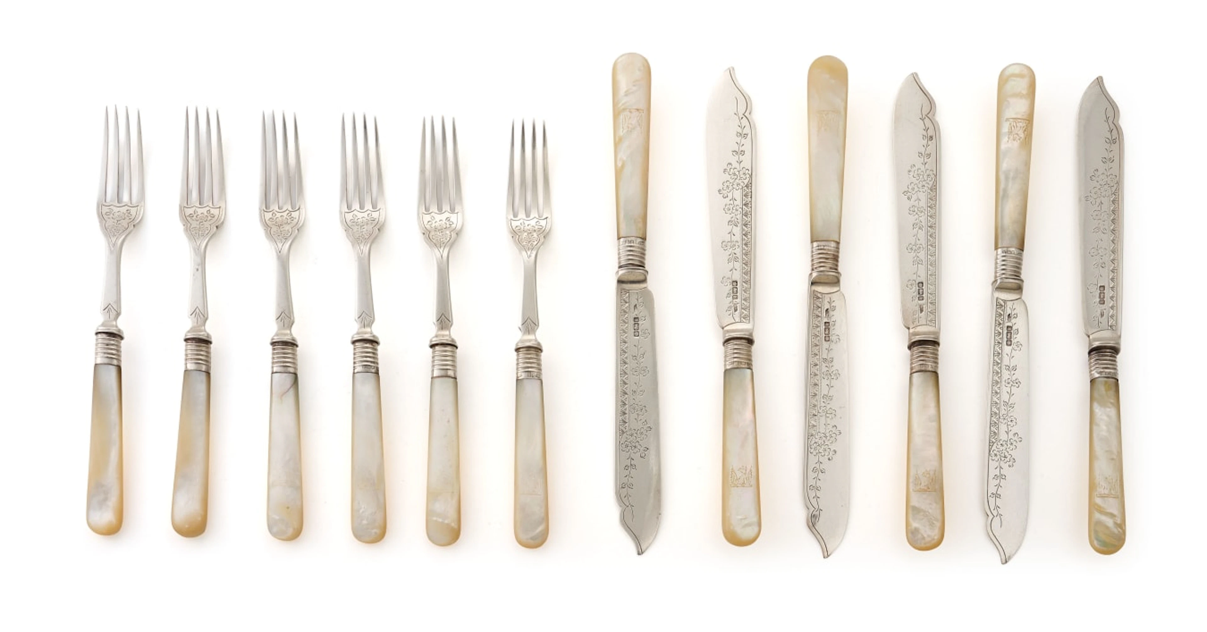 A set of twelve Edward VII silver and mother-of-pearl fish knives