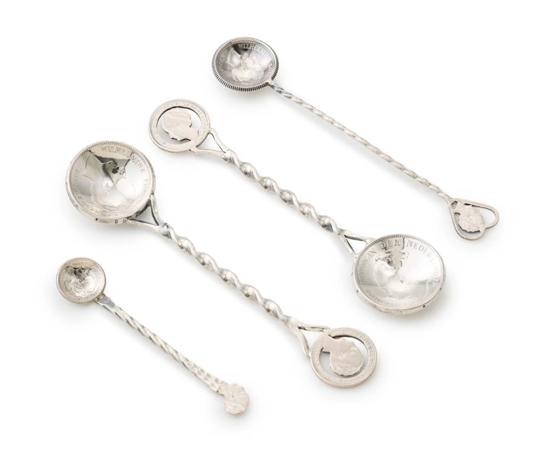 Four Dutch silver coin spoons, 20th century, in sizes