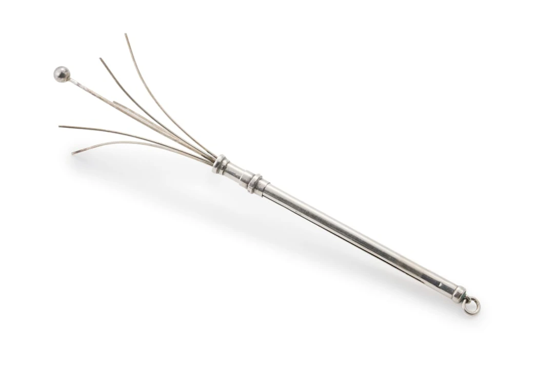A silver cocktail swizzle stick, Deakin & Francis Ltd, Birmingham, c.1894-1993