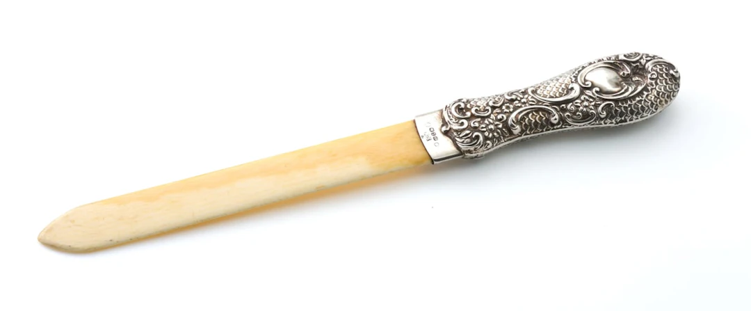 A Victorian silver and celluloid letter opener, Henry Matthews, Birmingham,1897