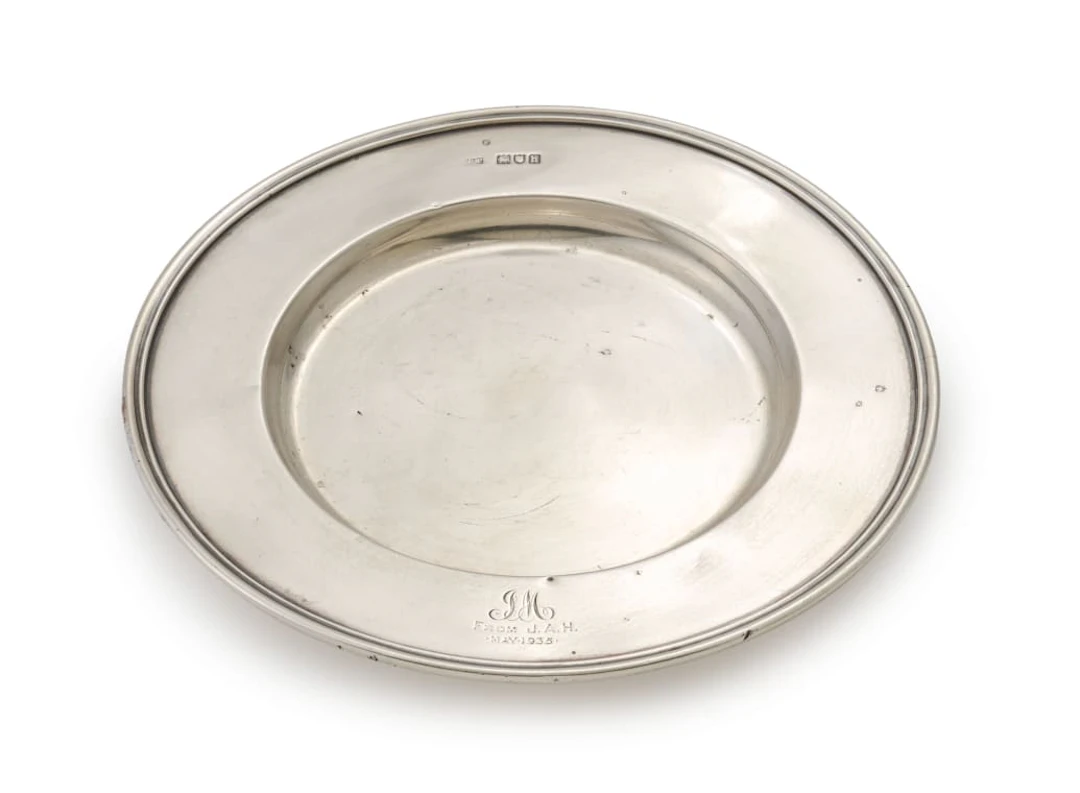 An Edward VII silver charger, Mappin & Webb Ltd, London, 1903