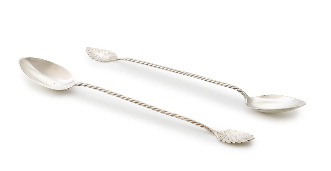 A pair of Dutch silver 'longdrinklepels', P. van Oostrom & Zn., Schoonhoven