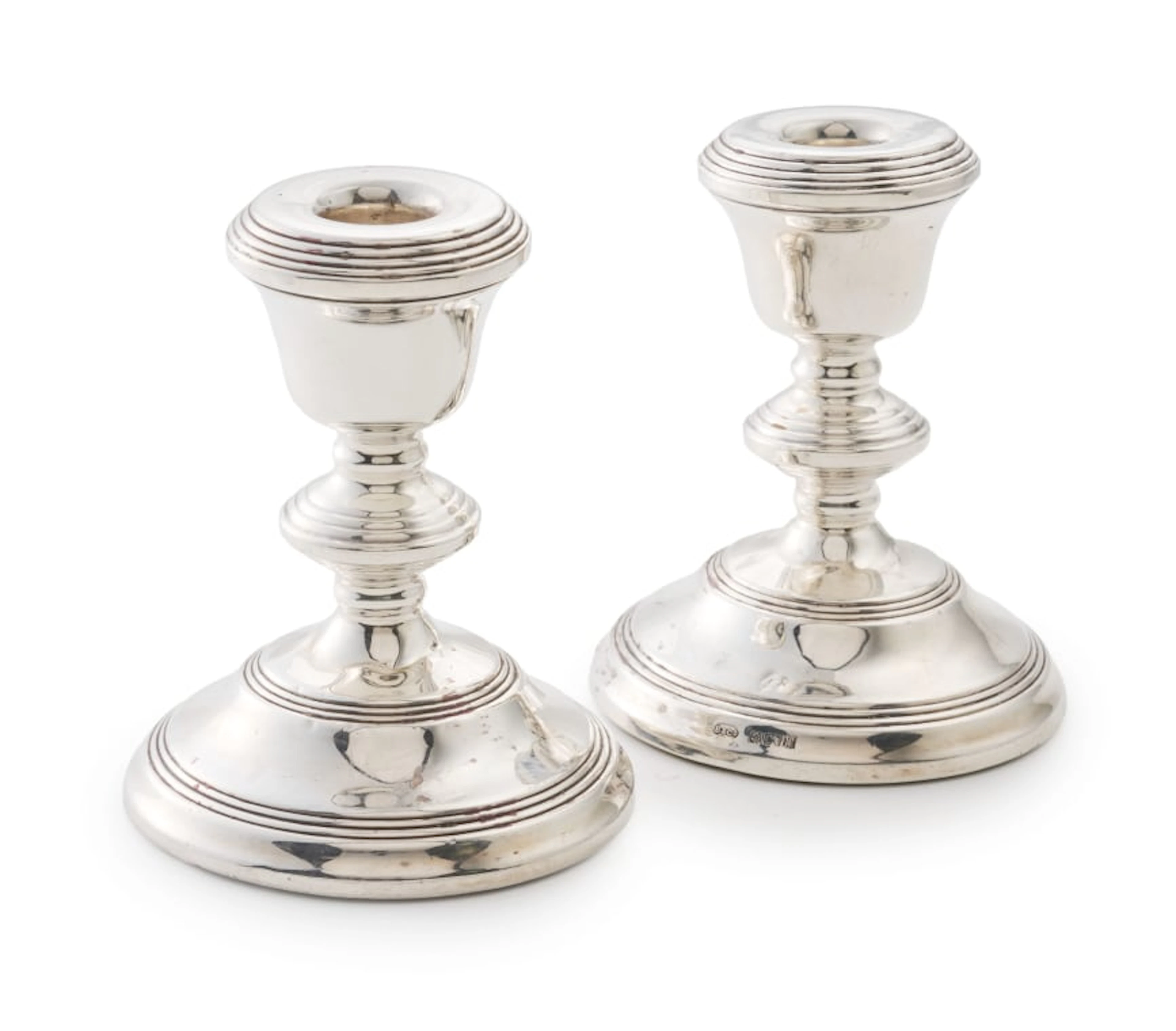 A pair of Elizabeth II silver candlesticks, W I Broadway & Co, Birmingham, 1971