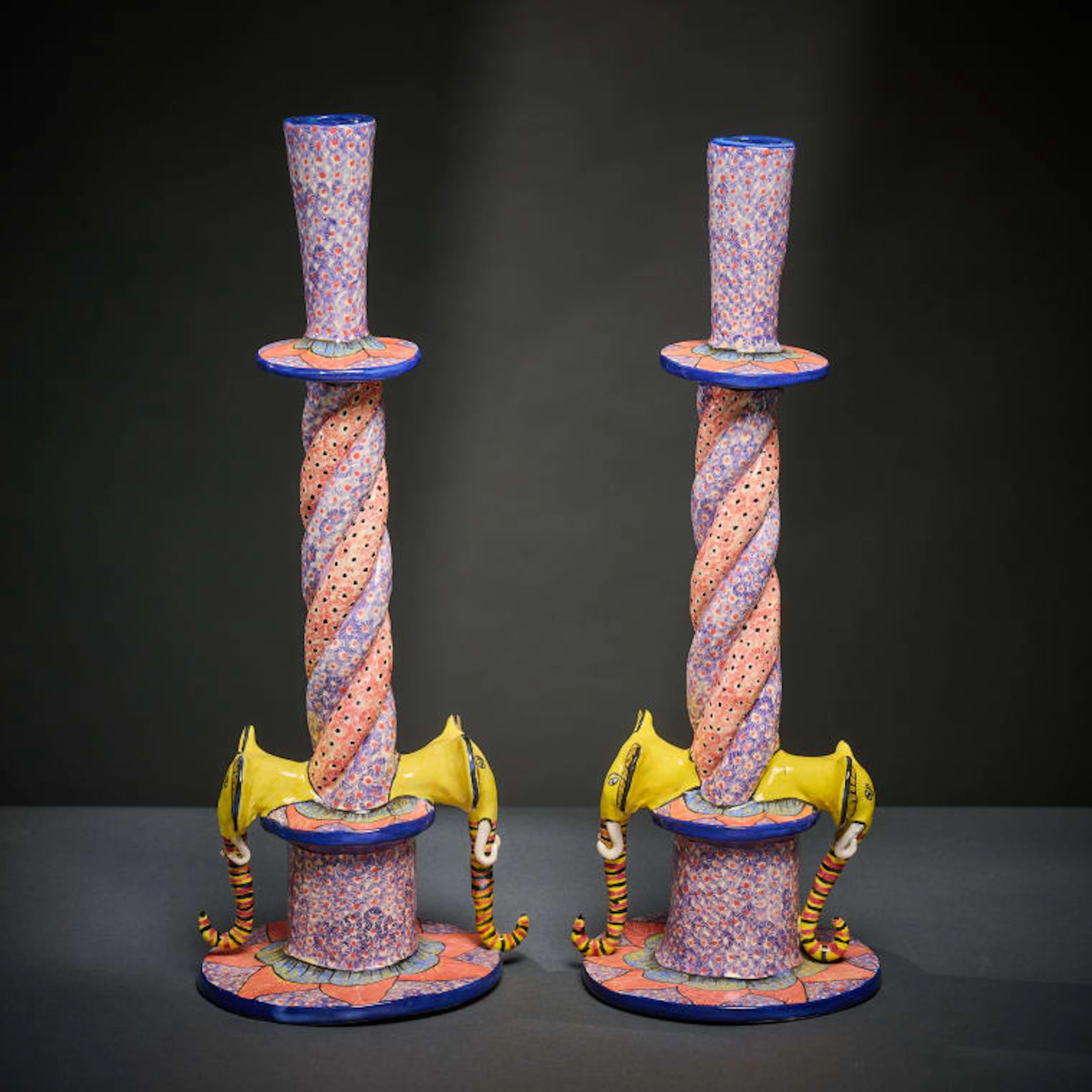 Ardmore Ceramic Studio; Pair of elephant candlesticks