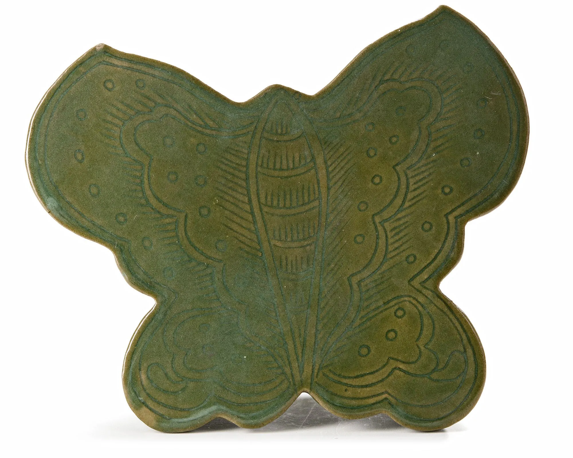 A CHINESE CELADON BUTTERFLY SHAPED PILLOW, 19TH CENTURY