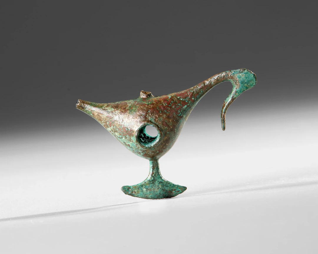 A GREEK GEOMETRIC BIRD FIGURE, 6TH CENTURY BC