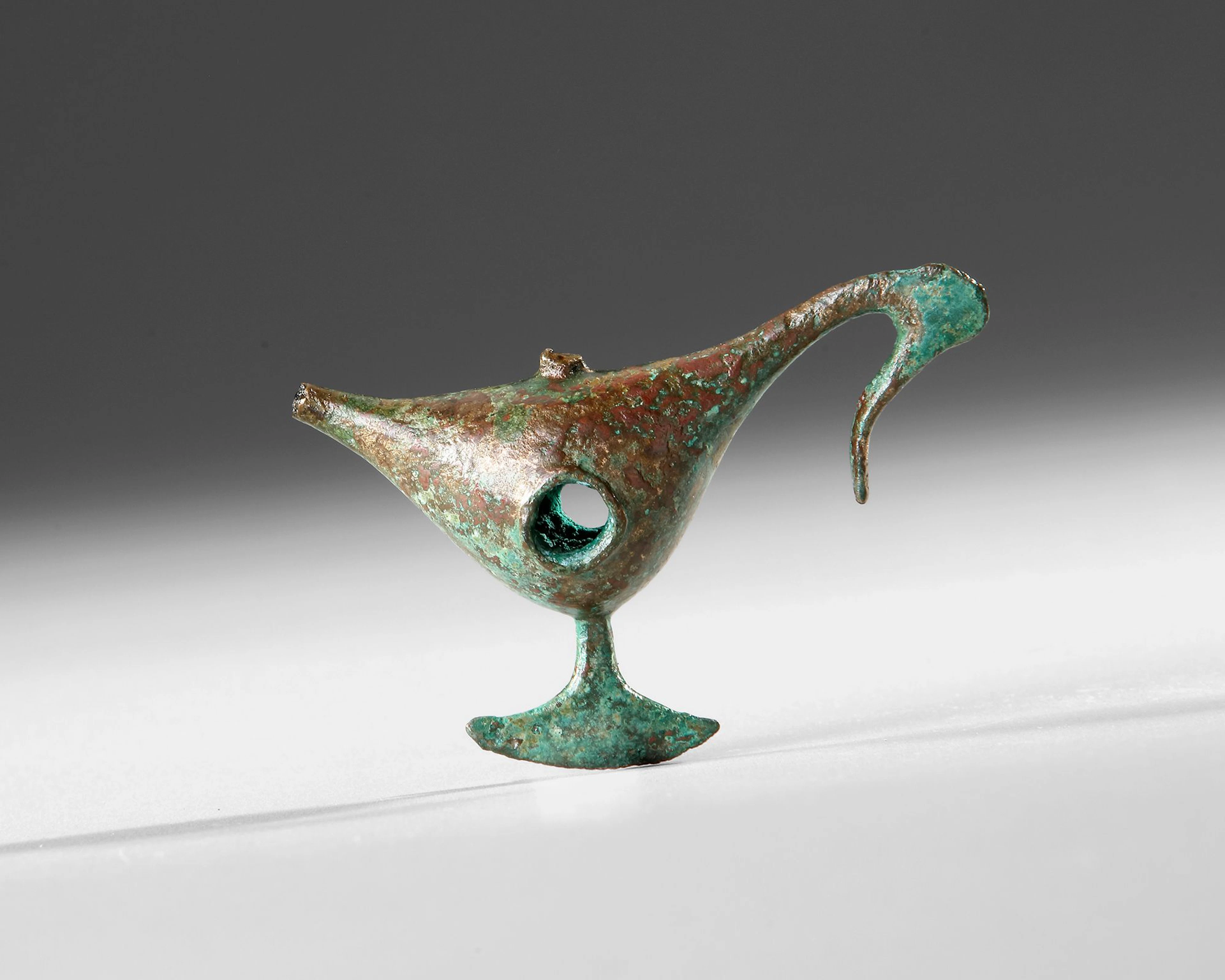 A GREEK GEOMETRIC BIRD FIGURE, 6TH CENTURY BC
