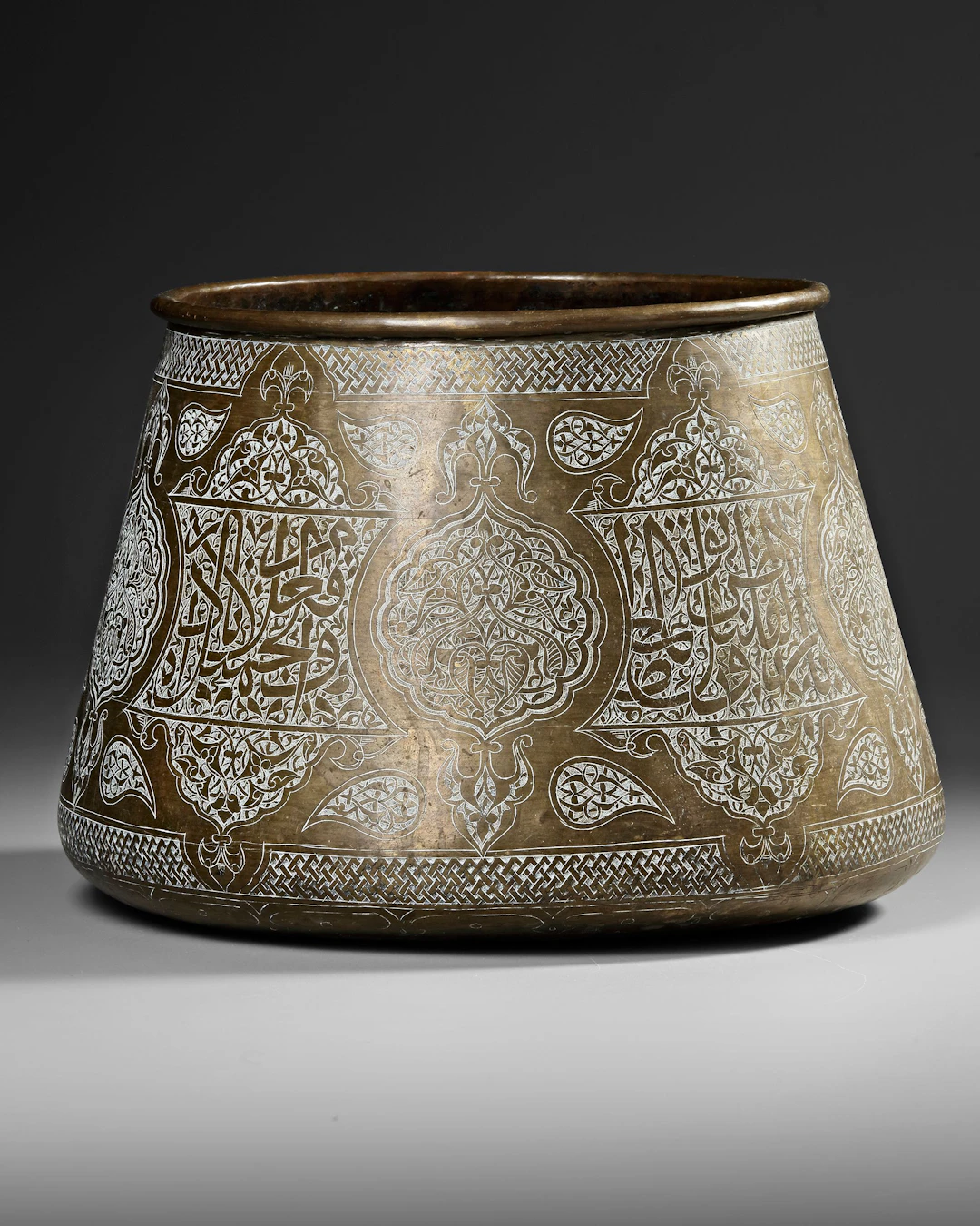 A SYRIAN HAMMERED BRASS BOWL, 19TH CENTURY