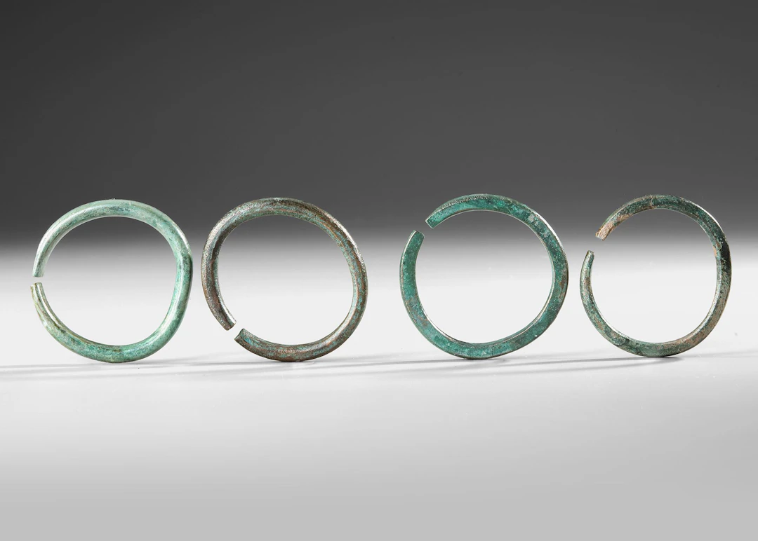 FOUR BRONZE BRACELETS, BRONZE AGE, 7TH CENTURY BC
