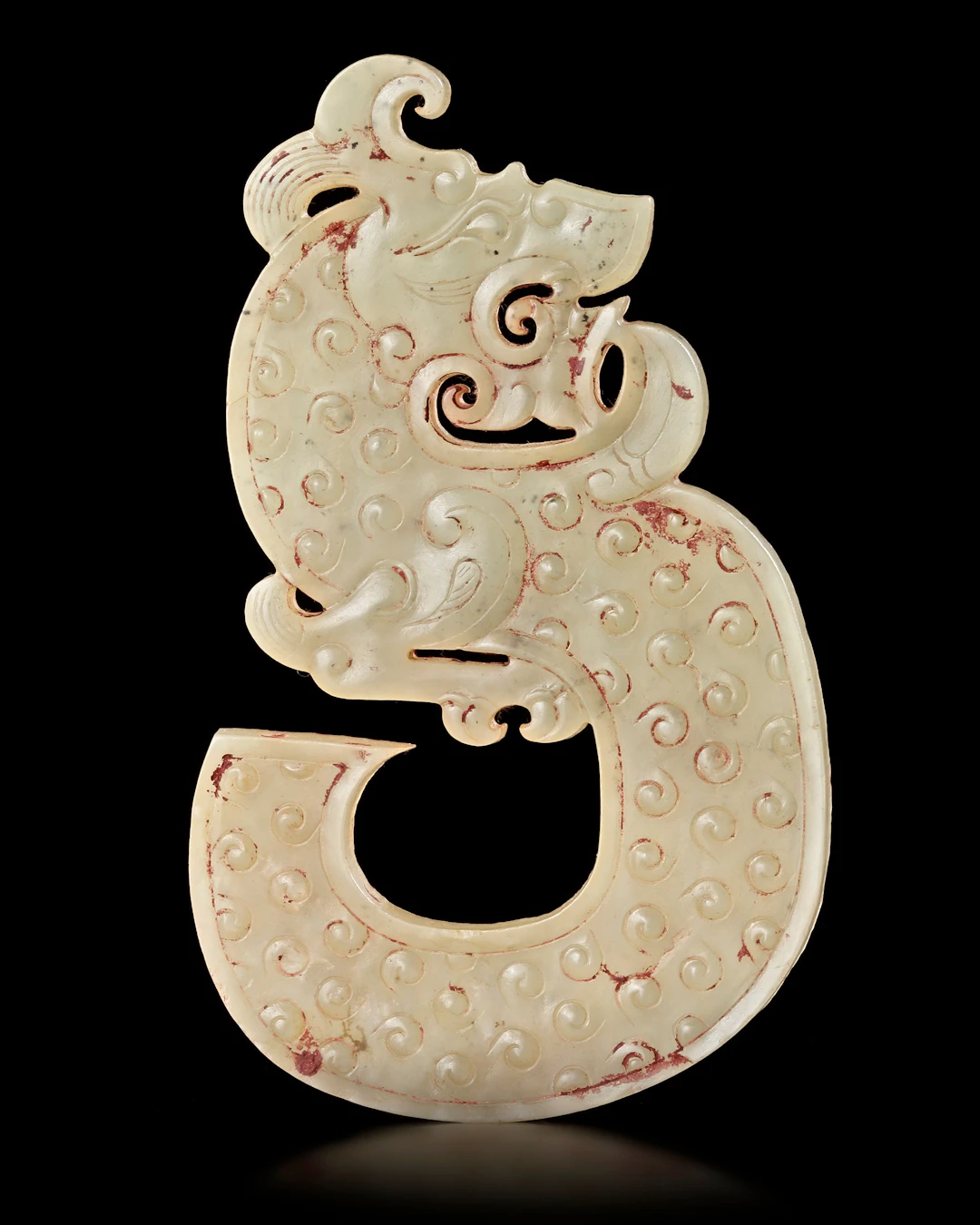 A CHINESE WHITE JADE DRAGON PENDANT, WESTERN HAN DYNASTY (206 BC-9 AD)