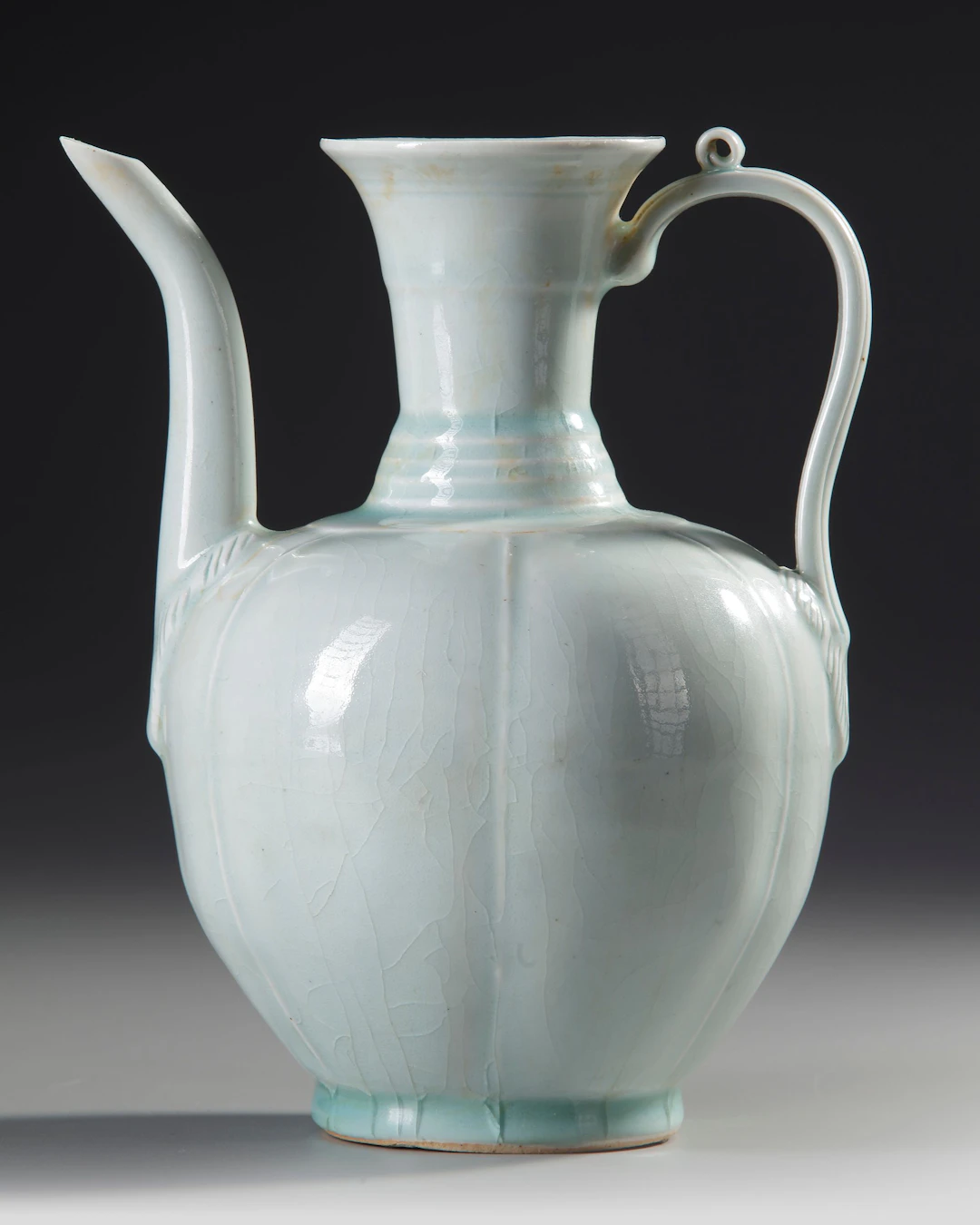 A CHINESE QINGBAI MELON-FORM EWER, SONG DYNASTY (960-1279 AD)